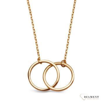 Złoty naszyjnik typu celebrytka, z elementem ozdobnym w kształcie dwóch przecinających się obręczy, to biżuteria która zachwyca swoją formą..jpg
