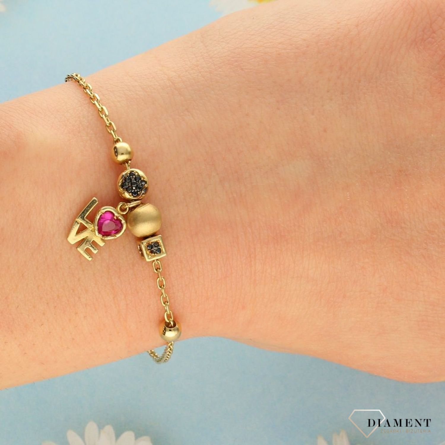Złota bransoletka elementy ozdobne.Elementy w cyrkonie. Złote Bransoletki Damskie w Sklepie z Biżuterią zegarki-diament.pl to idealny pomysł na prezent dla kobiety.1 (2).jpg