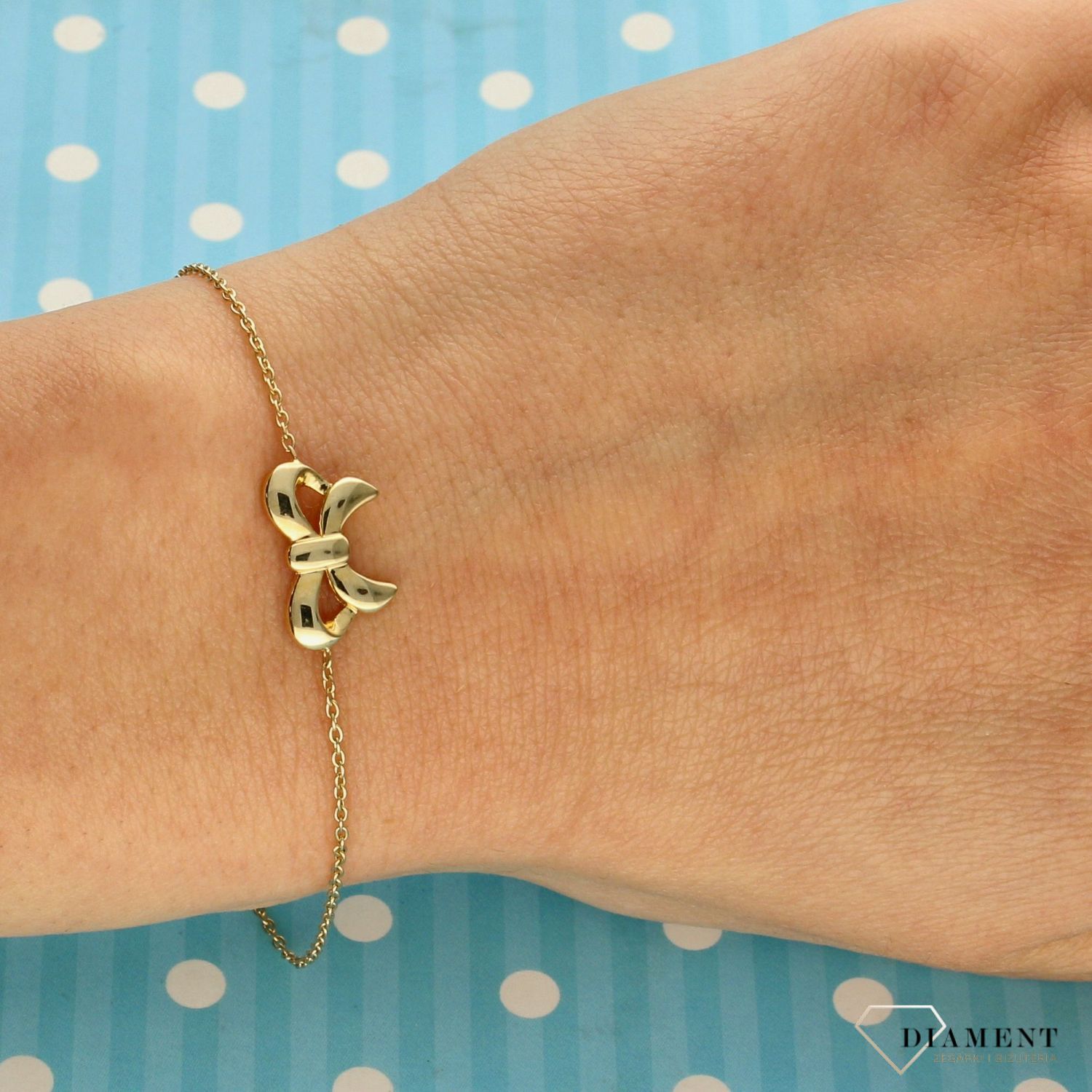 Bransoletka damska złota celebrytka ' Kokarda ' 000000-167 (1).jpg