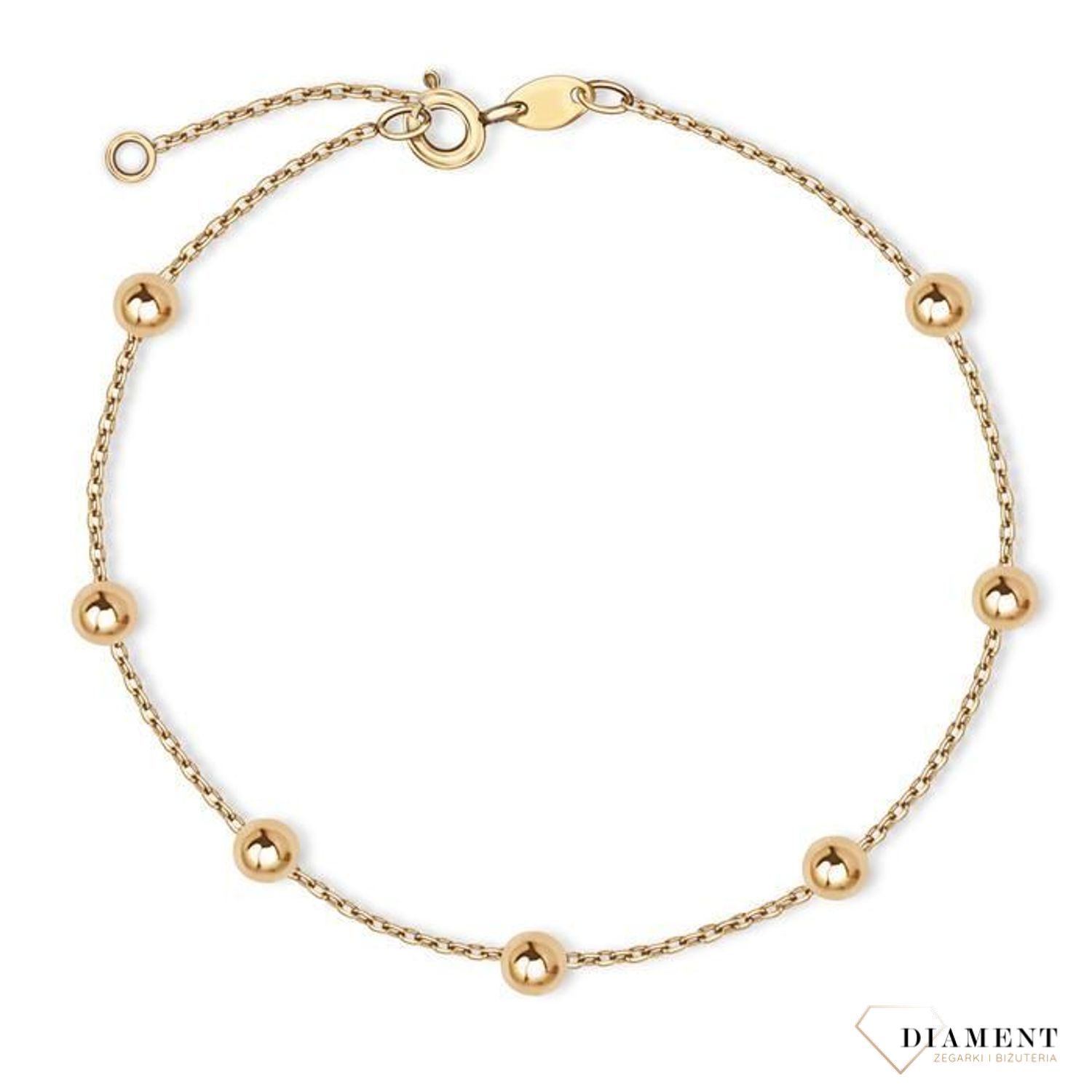 Klasyczna, złota bransoletka skomponowana z cienkiego łańcuszka i delikatnych złotych kuleczek to subtelna i piękna ozdoba kobiecego nadgarstka..jpg