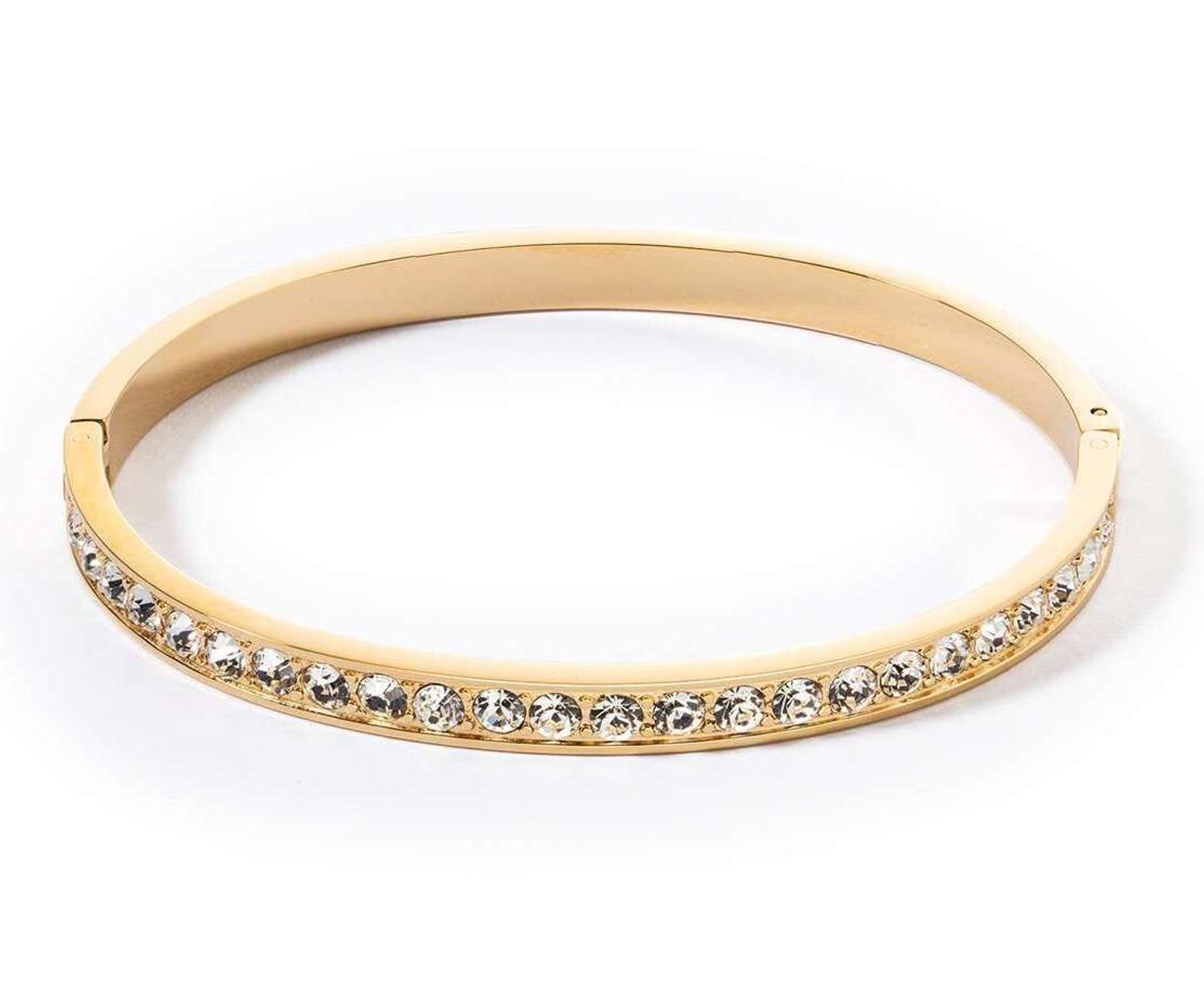 Bransoletka damska Coeur De Lion sztywna białe kryształki Swarovski 0131331816. Bransoletka damska Coeur De Lion  to prosta stalowa biżuteria w kolorze złotym wykonana w Niemczech z białymi kryształami Swarovsk.jpg