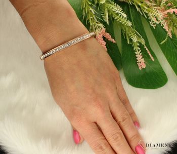 Bransoletka damska Coeur De Lion sztywna białe kryształki Swarovski 0131371822. Bransoletka damska Coeur De Lion  to prosta stalowa biżuteria w kolorze różowego złotasdds (2).jpg