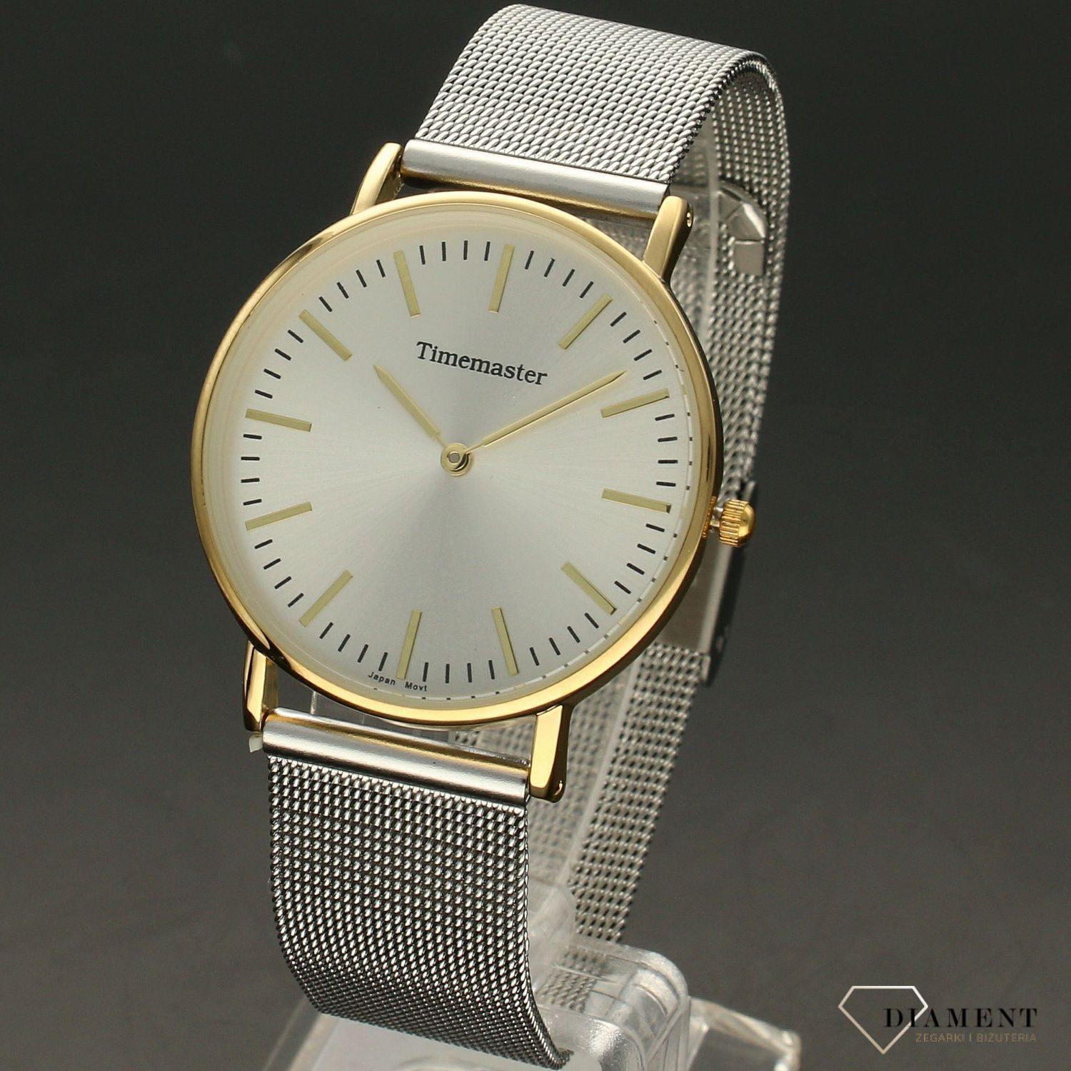Zegarek damski TIMEMASTER 023-12 srebrna tarcz złote indeksy. Zegarek damski w srebrno- złotej kolorystyce. Zegarek damski ze srebrną tarczą ozdobiony złotą koperta i złotymi indeksami i wskazówkami. Świetny dodatek pasujący d.jpg