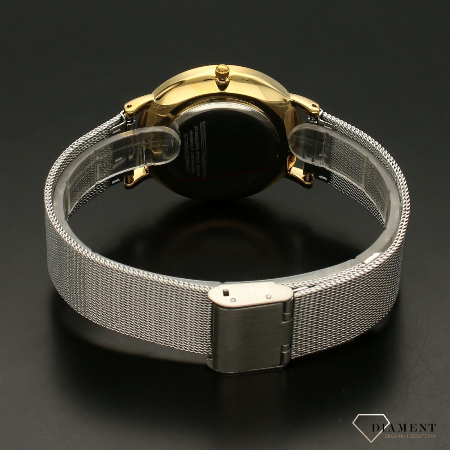 Zegarek damski TIMEMASTER 023-12 srebrna tarcz złote indeksy. Zegarek damski w srebrno- złotej kolorystyce. Zegarek damski ze srebrną tarczą ozdobiony złotą koperta i złotymi indeksami i wskazówkami. Świetny dodatek pasujący d.jpg