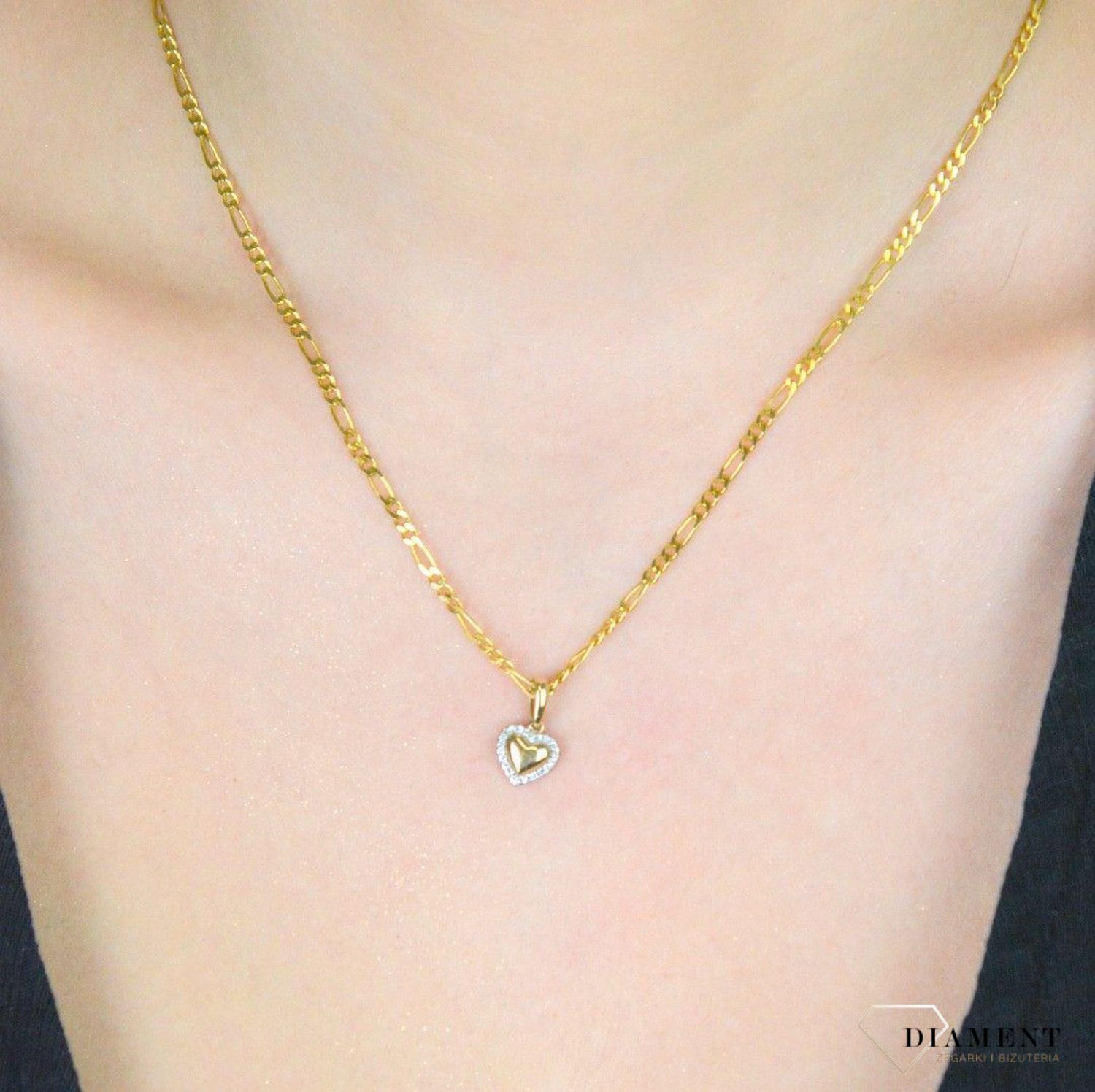 Zawieszka złota serce z diamentami HSI 0,06ct22  P56066 Y Zawieszka złota damska serce z 22 Diamentami 585 P56066 Y. Zawieszka wykonana żółtego złota próby 585 o ponadczasowej formie serca. 1.jpg