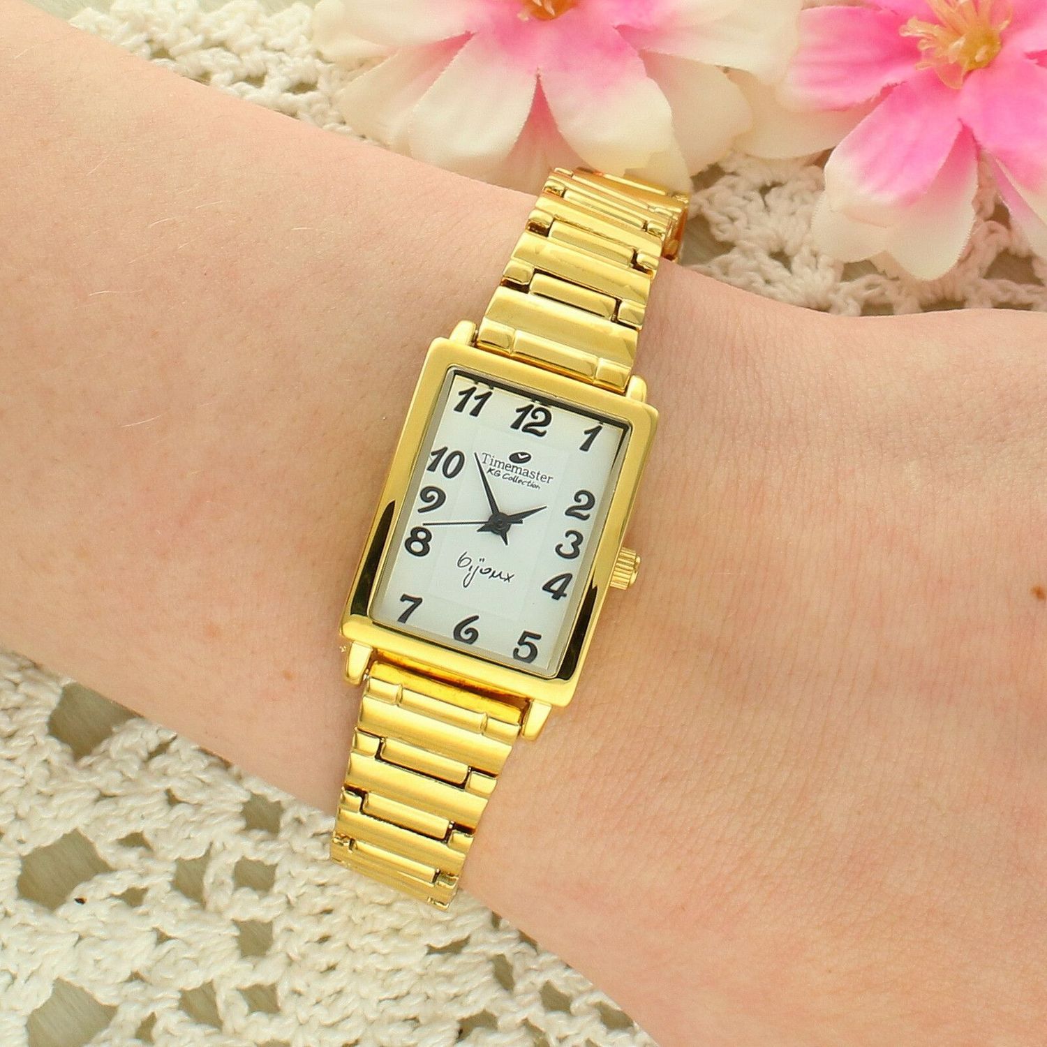 Zegarek damski Timemaster Bijoux – złota bransoleta, prostokątna koperta, klasyczna tarcza z cyframi arabskimi.jpg