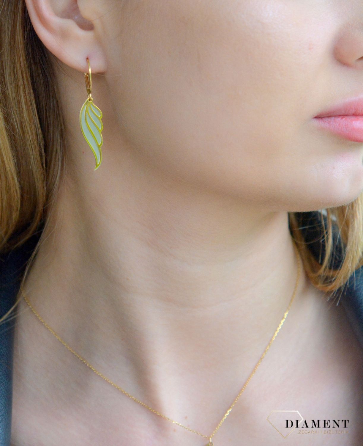 Srebrne kolczyki damskie 925 pokryte złotem Skrzydełka 0712864697. Srebrne kolczyki damskie. Kolczyki damskie pokryte złotem. Kolczyki srebrne skrzydełka Kolczyki damskie pozłacane na prezent..jpg