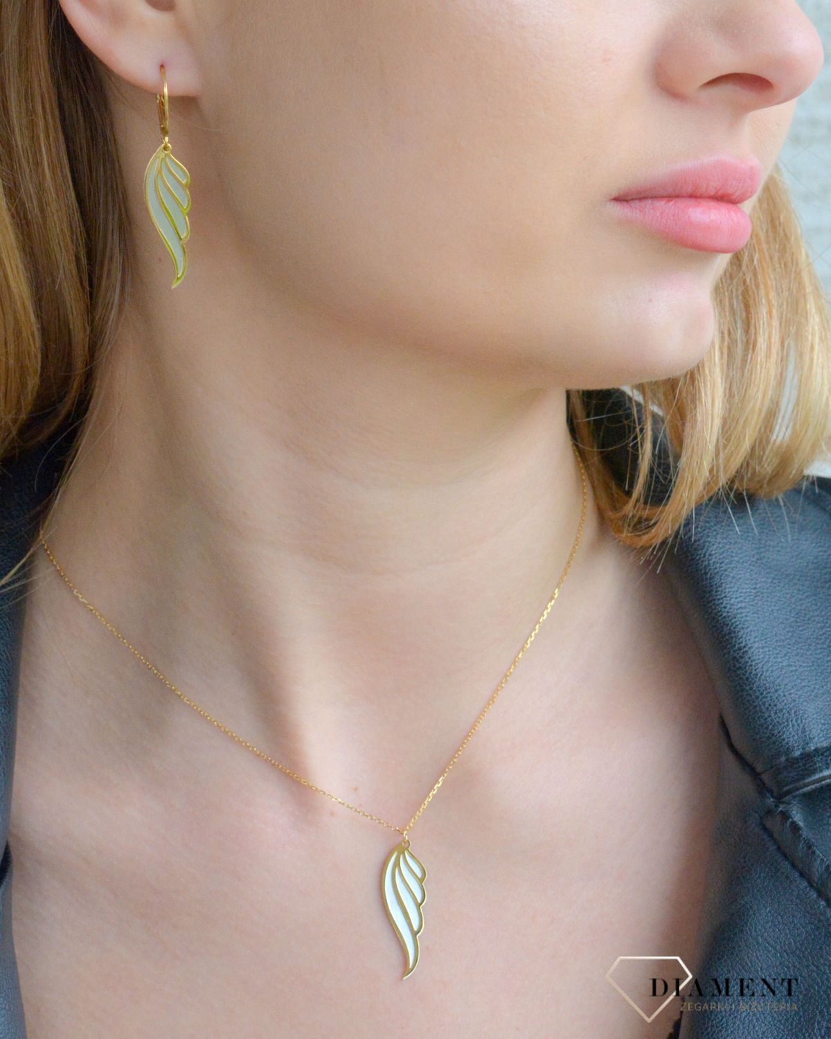 Srebrne kolczyki damskie 925 pokryte złotem Skrzydełka 0712864697. Srebrne kolczyki damskie. Kolczyki damskie pokryte złotem. Kolczyki srebrne skrzydełka Kolczyki damskie pozłacane na prezent..jpg