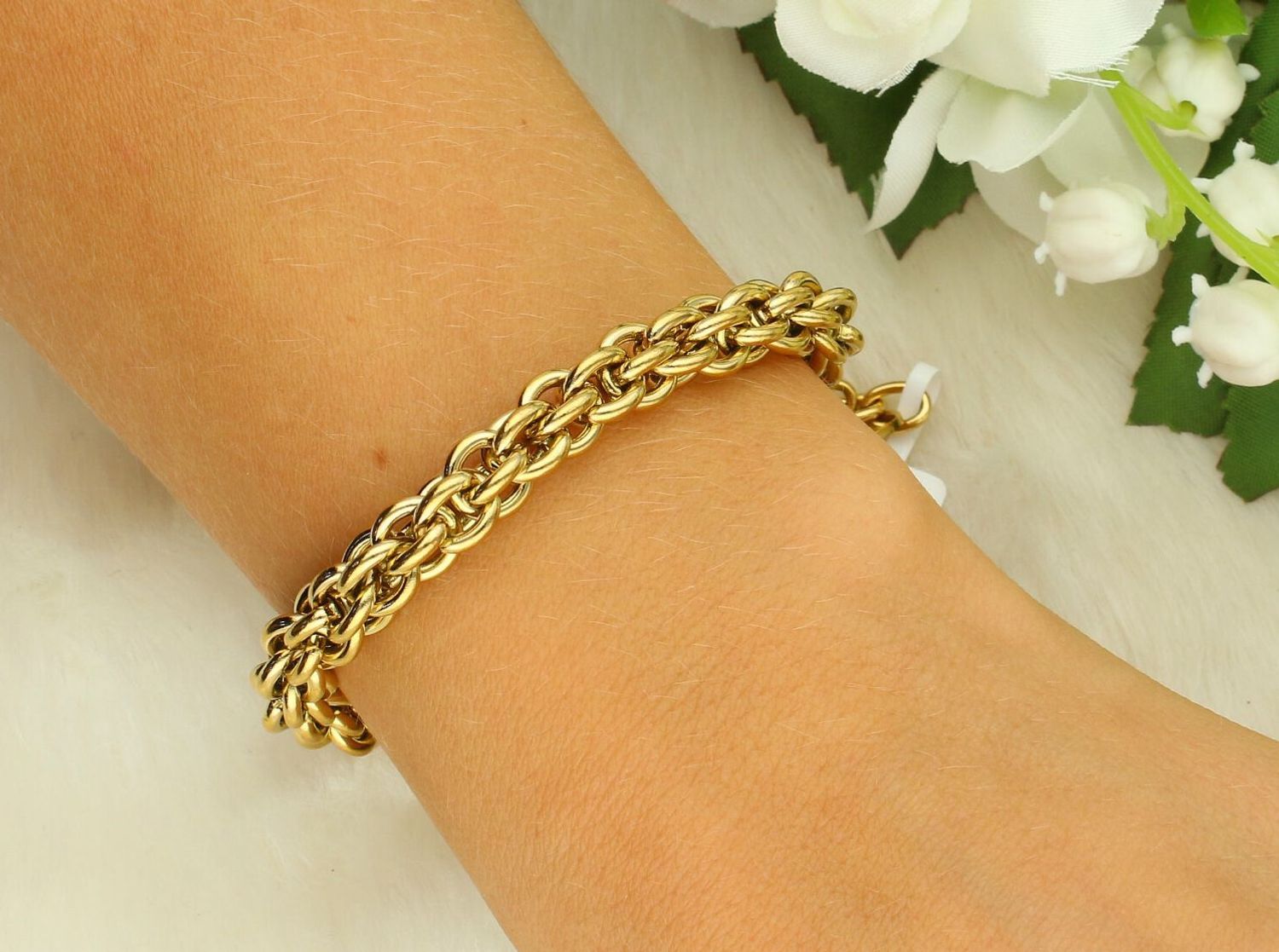 Bransoletka damska Coeur de Lion 080330-1600 Essentials żółte złoto stal szlachetna.jpg