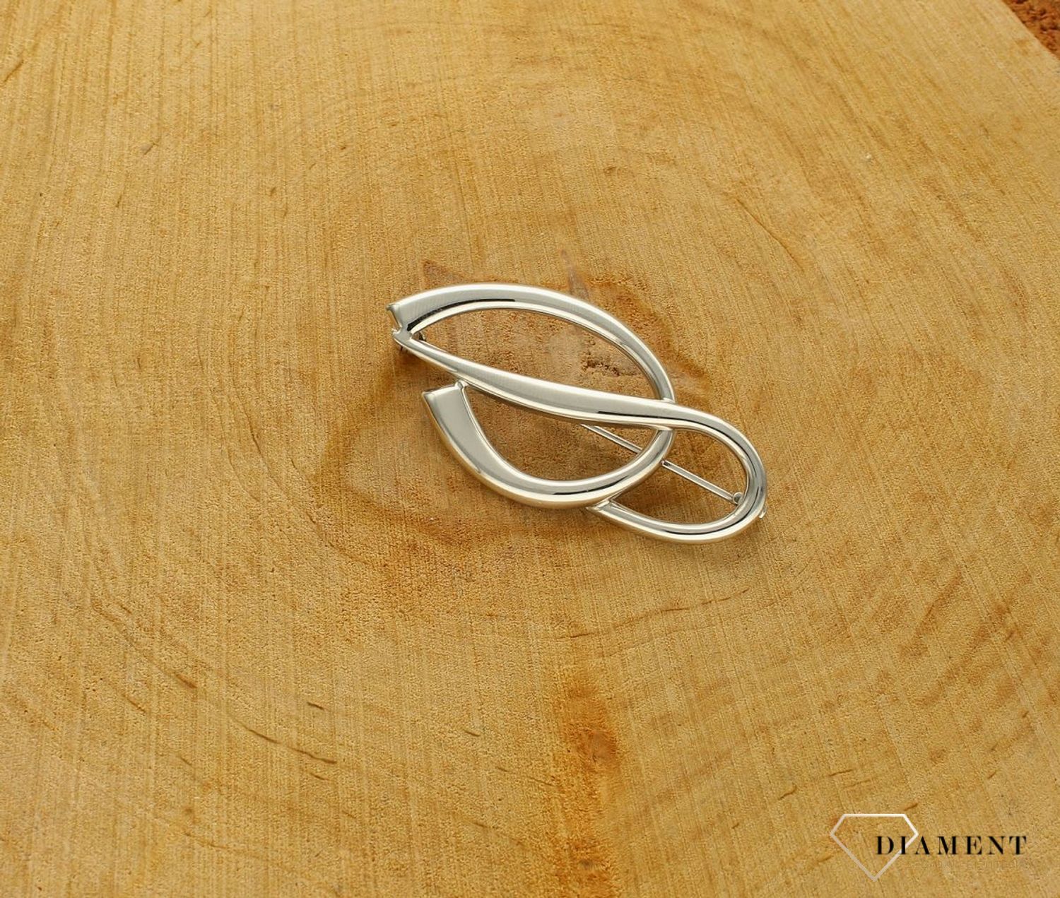 Srebrna broszka gładka o owalnym kształcie 0837000400. Jest to świetny dodatek, który urozmaici kobiece stylizacje. Element kolekcji, w której główną rolę gra ponadczasowy wzór. Srebrna broszka o klasycznym kształcie idealna na pre (3).jpg