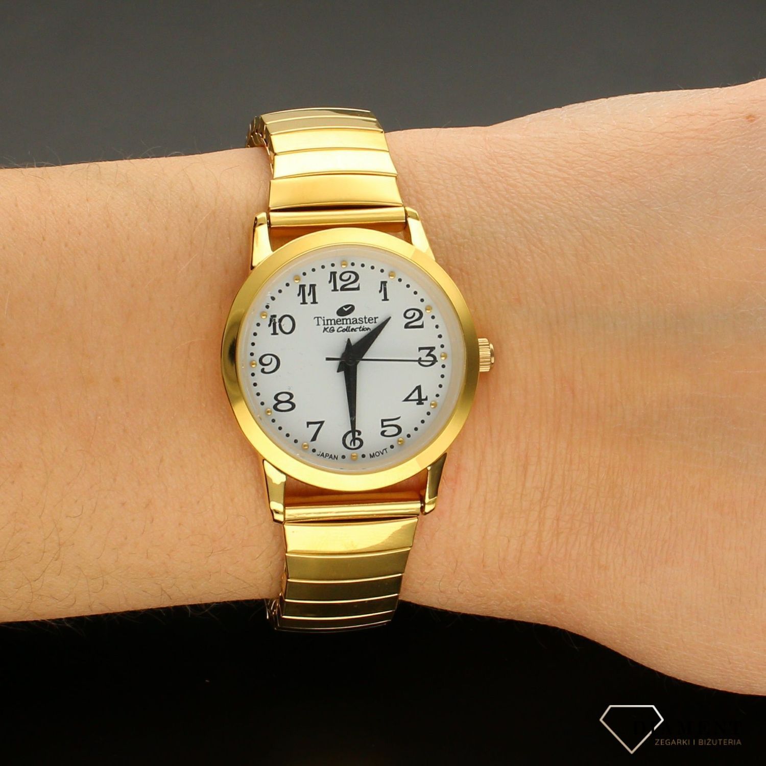 Zegarek damski na elastycznej bransolecie  TIMEMASTER 092-18. Zegarek damski na bransolecie. Zegarek damski złoty. Zegarek rozciągany elastyczny. Damski zegarek Timemaster.  (2).jpg