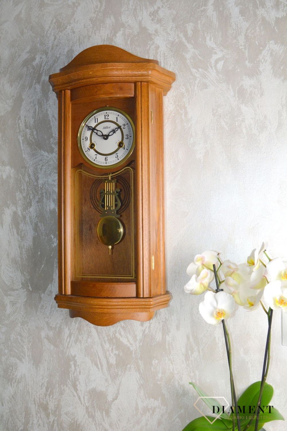 Zegar ścienny z wahadłem drewniany Adler Dębowy 11017D. Zegar wyposażony jest w mechaniczny mechanizm.  (3).JPG