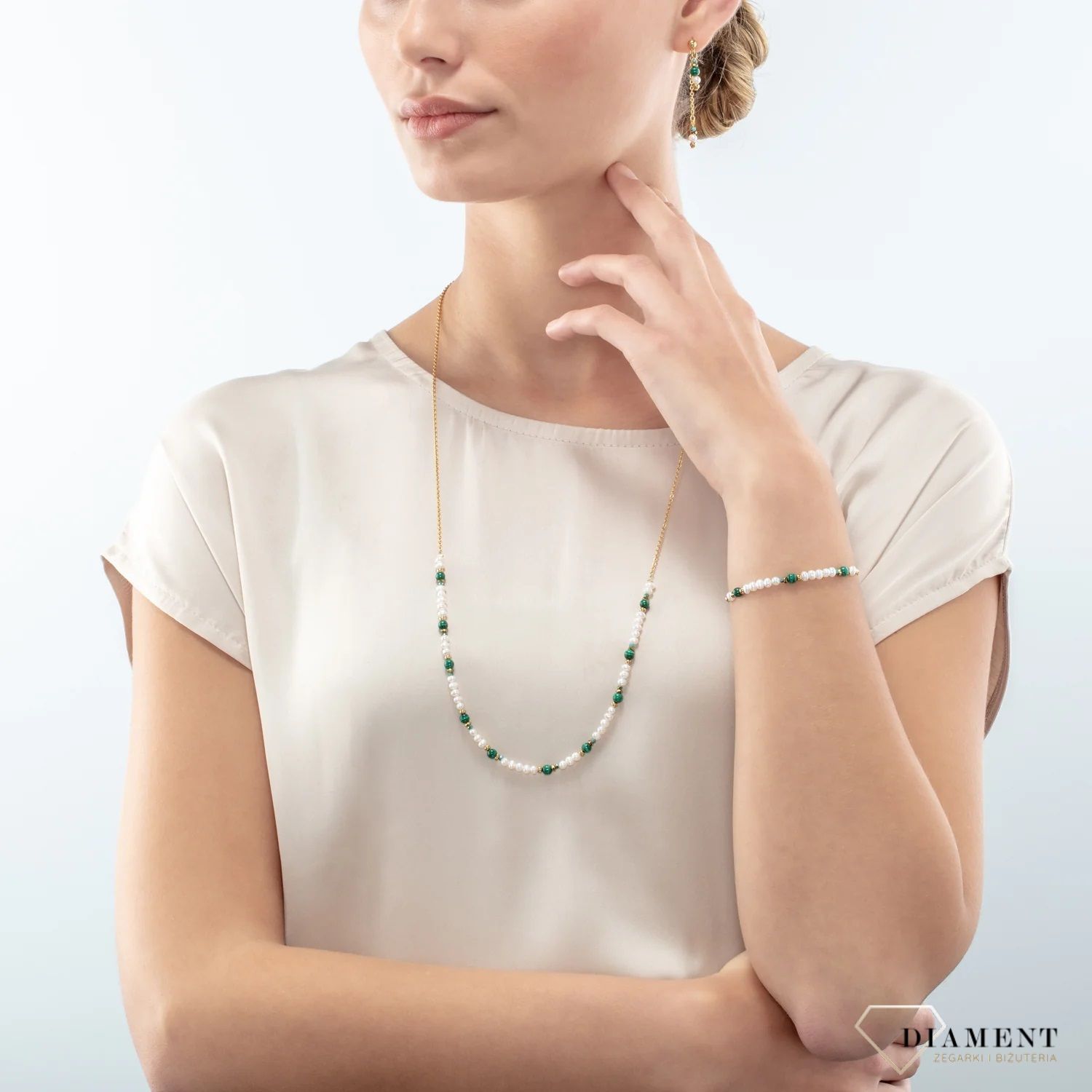 Naszyjnik damski Swarovski Coeur De Lion perła słodkowodna, malachit 4251588327720.  Biżuteria idealna zarówno na eleganckie, jak i niezobowiązujące okazje, ten naszyjnik wykonany jest z połyskujących kryształów.jpg