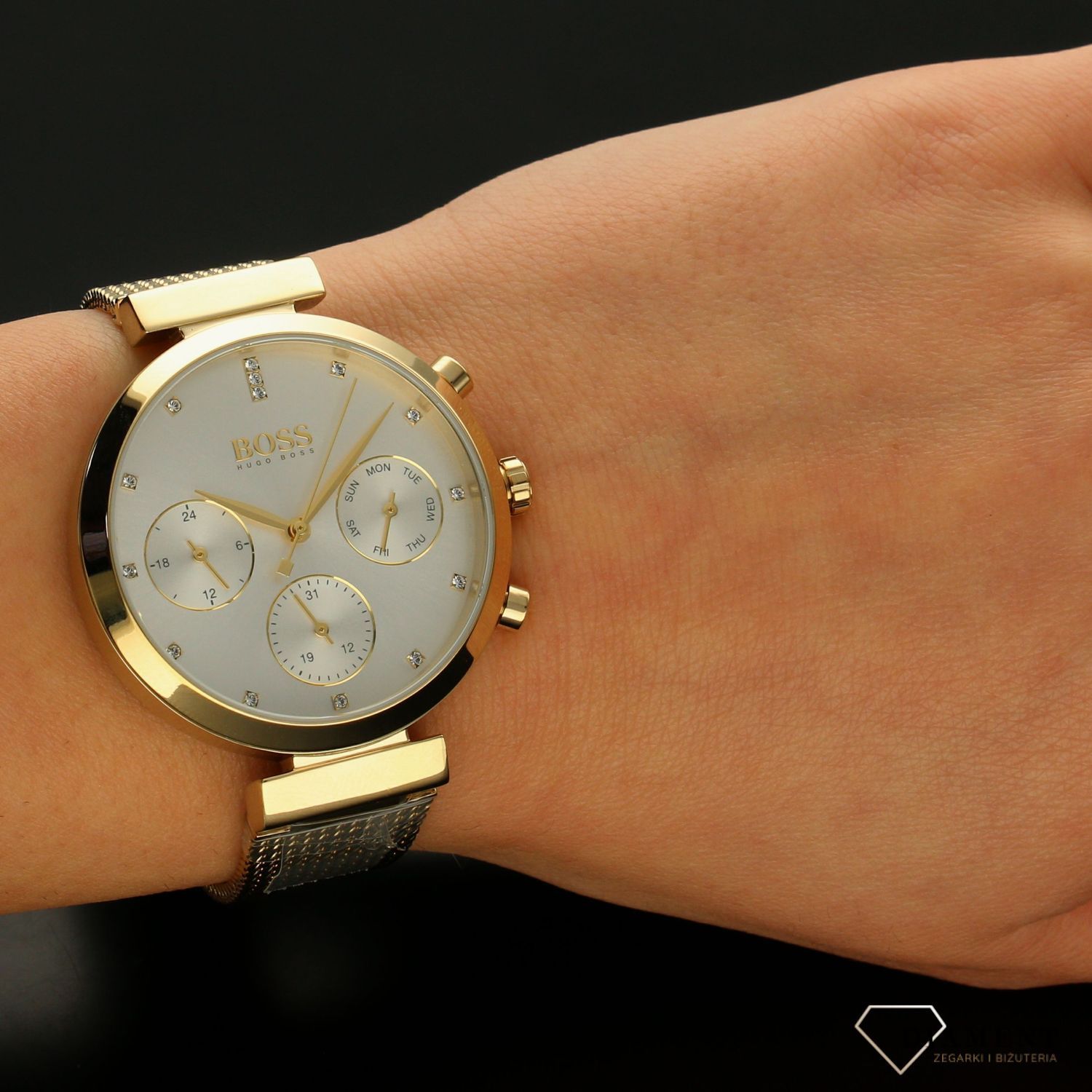 Zegarek damski na złotej bransolecie z nowoczesną multidatą. Delikatna bransoleta dodaje wdzięku. Zegarek o numerze katalogowym 1502552.jpg