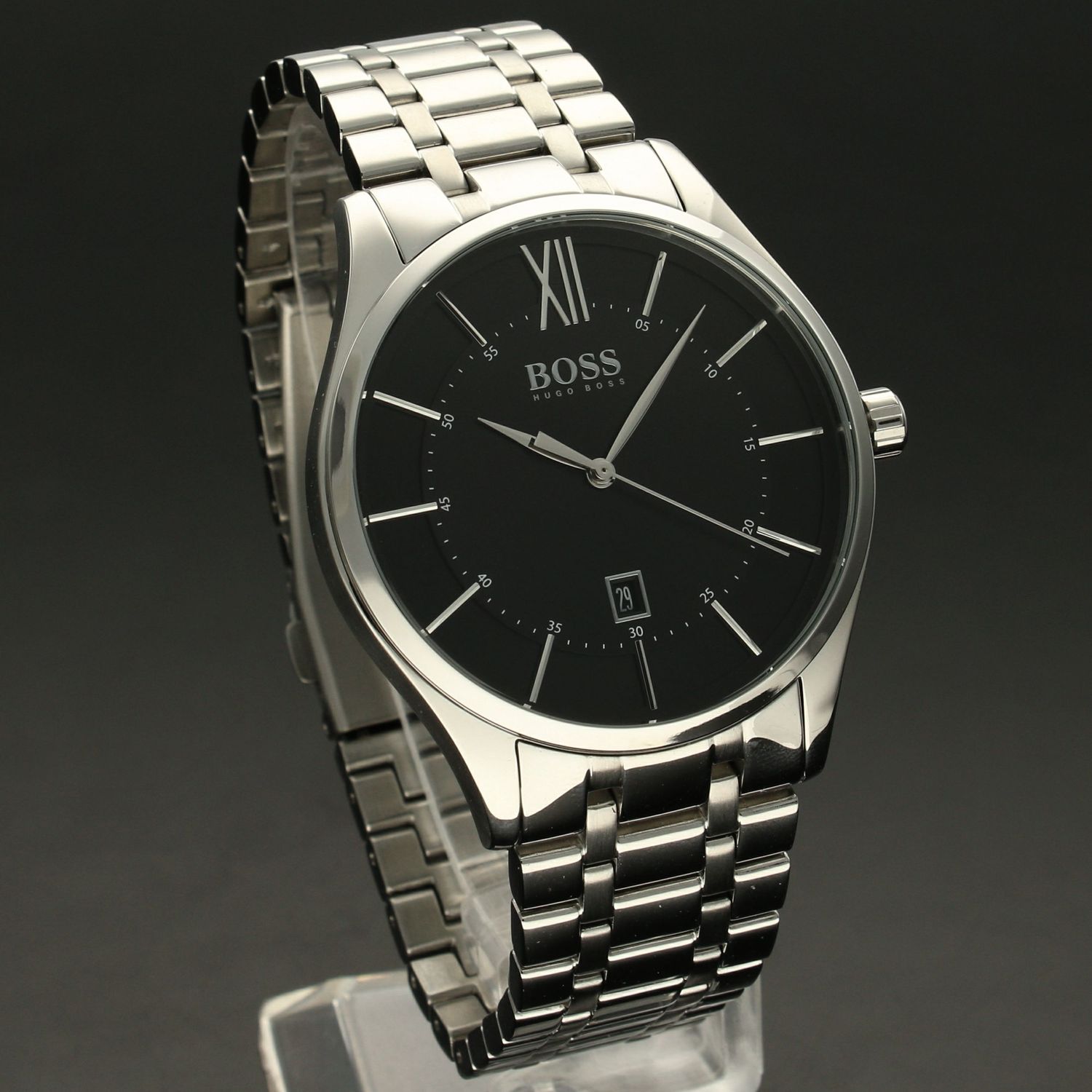 Zegarek męski Hugo Boss 1513797 Distinction to zegarek do garnituru na stalowej, srebrnej bransolecie z japońskim mechanizmem. Zegarek elegancki z czarną tarczą i prostymi indeksami. Propozycja dedykowana miłośnikom k.jpg