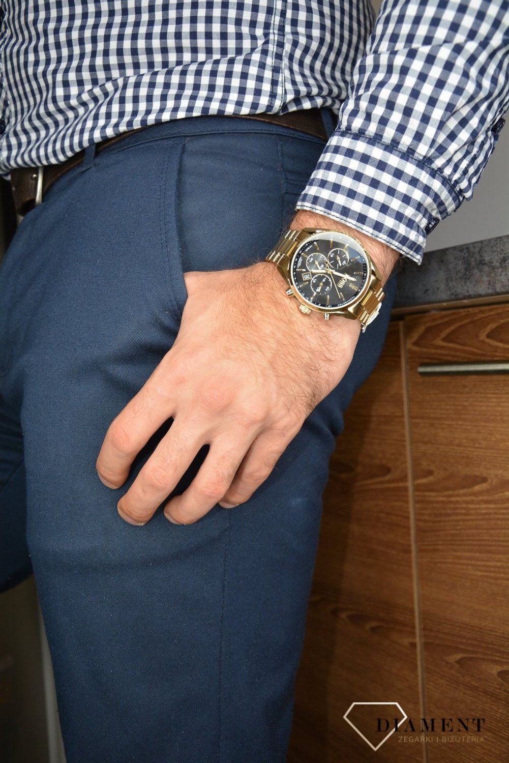 Zegarek męski Hugo Boss Champion 'Złoty BOSS' 1513848 to zegarek na stalowej, pozłacanej bransolecie z japońskim mechanizmem. Zegarek złoty z czarną tarczą i prostymi indeksami. Propozycja dedykowana miłośnikom klasyc.jpg
