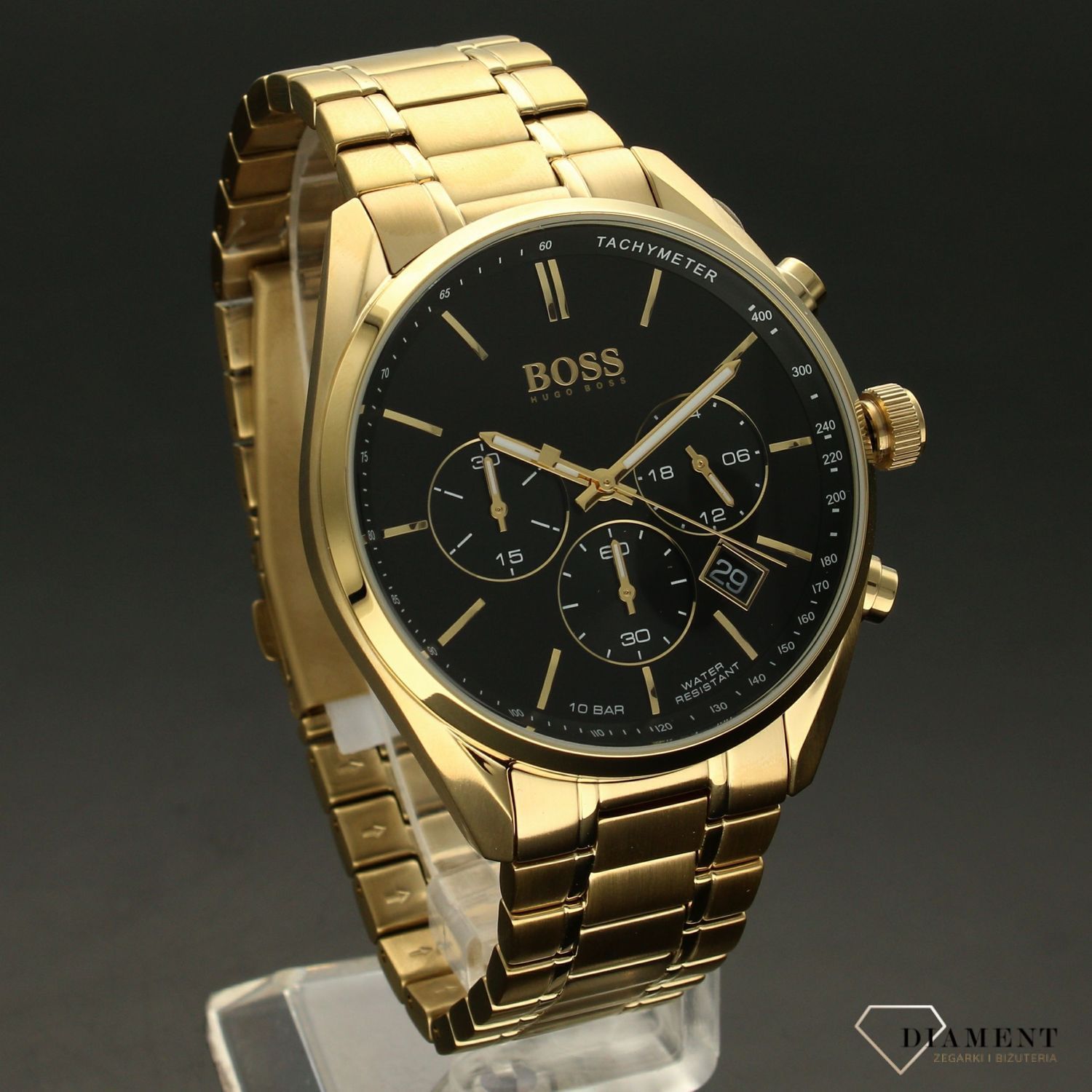 Zegarek męski Hugo Boss Champion 'Złoty BOSS' 1513848 to zegarek na stalowej, pozłacanej bransolecie z japońskim mechanizmem. Zegarek złoty z czarną tarczą i prostymi indeksami. Propozycja dedykowana miłośnikom klasyc.jpg