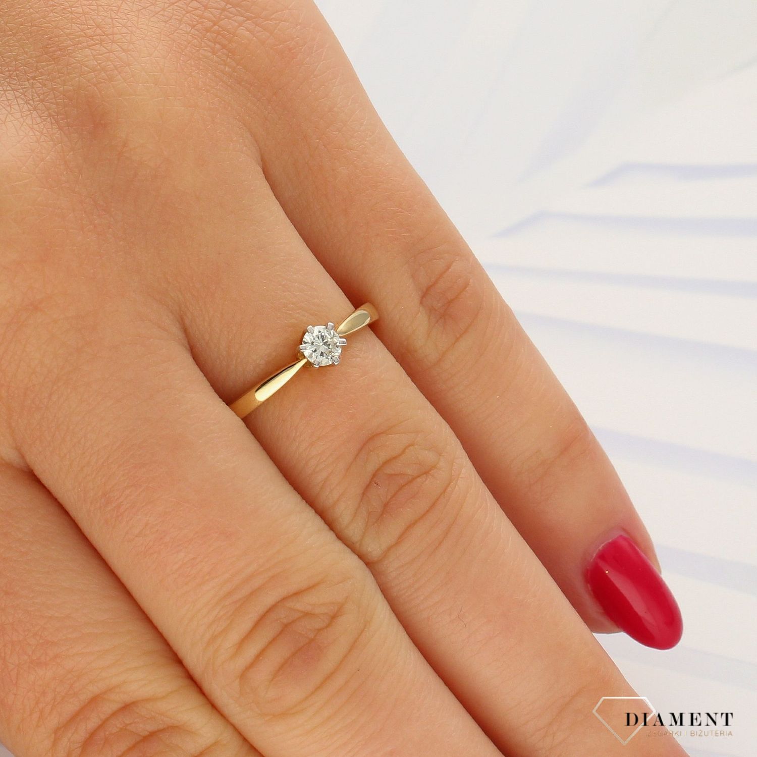 Pierścionek złoty DIAMENT 16042PI I SI, pierścionek zaręczynowy,  wykonany ze złota próby 585. Pierścionek z diamentem wielkości 0,17 ct, czystości SI oraz barwie I. Waga 1,81 gram..jpg
