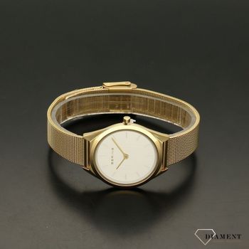 Zegarek damski w złotej kolorystyce to idealny prezent dla kobiety, lubiącej klasyczne dodatki w postaci zegarka na ręku. Zegarek damski na stalowej bransolecie (4).jpg