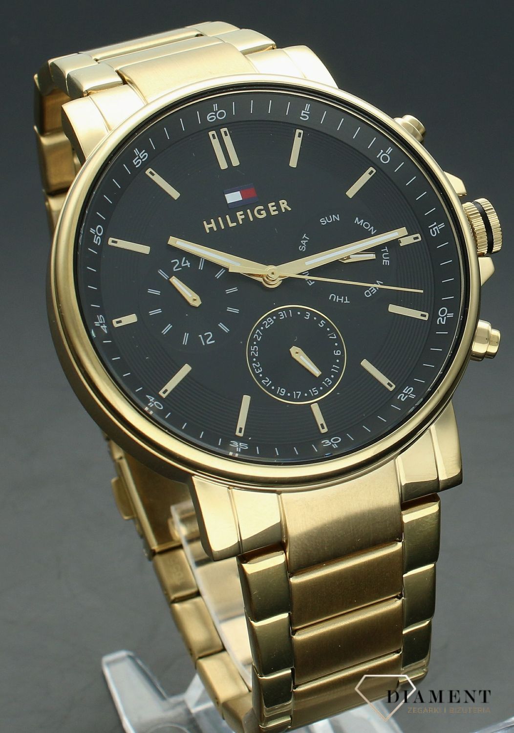 Zegarek męski na bransolecie Tommy Hilfiger Tyson 1710589.  Męski zegarek na bransolecie Tommy Hilfiger. Zegarek męski Tommy Hilfiger z czarną tarcza. Zegarek modowy na złotej bransolecie . Zegarek męski Tommy.jpg