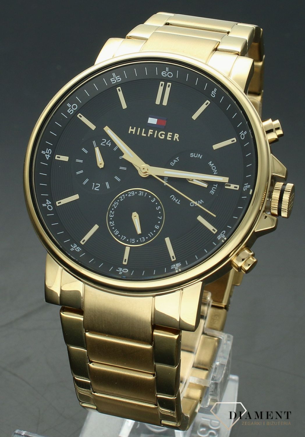 Zegarek męski na bransolecie Tommy Hilfiger Tyson 1710589.  Męski zegarek na bransolecie Tommy Hilfiger. Zegarek męski Tommy Hilfiger z czarną tarcza. Zegarek modowy na złotej bransolecie . Zegarek męski Tommy.jpg