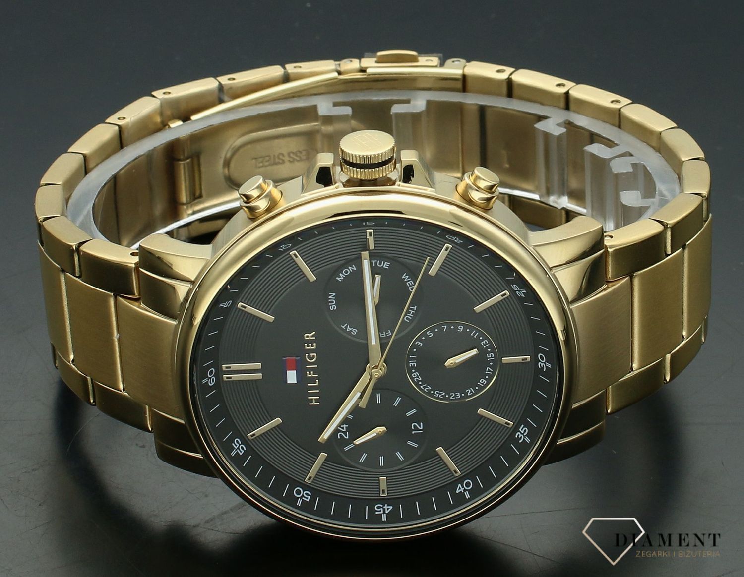 Zegarek męski na bransolecie Tommy Hilfiger Tyson 1710589.  Męski zegarek na bransolecie Tommy Hilfiger. Zegarek męski Tommy Hilfiger z czarną tarcza. Zegarek modowy na złotej bransolecie . Zegarek męski Tommy.jpg