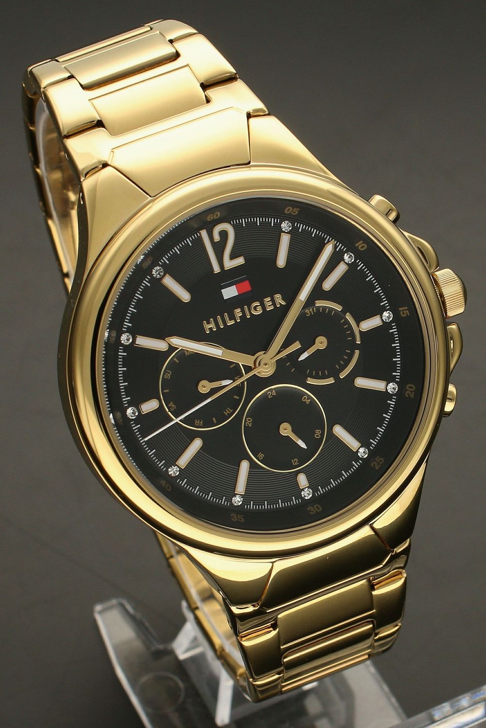 Złoty zegarek damski  TOMMY HILFIGER 1782599 z czarną tarczą i białymi indeksami.jpg