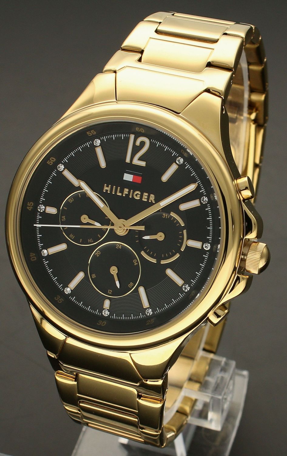 Złoty zegarek damski  TOMMY HILFIGER 1782599 z czarną tarczą i białymi indeksami.jpg