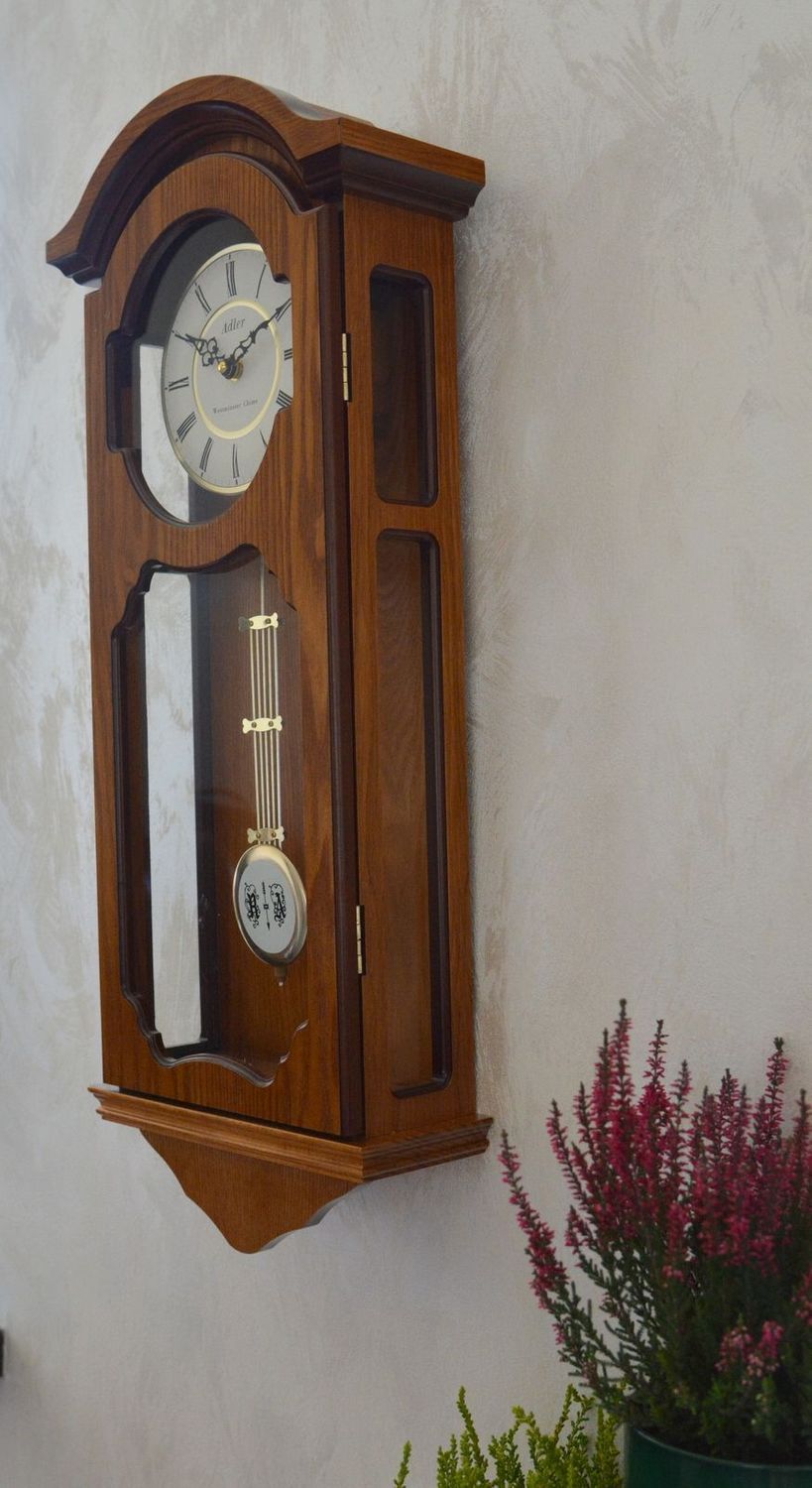 Zegar ścienny drewniany wiszący Adler dębowy 20040D. Zegar drewniany z wahadłem. Zegar wyposażony jest w kwarcowy mechanizm, zasilany za pomocą baterii (6).JPG