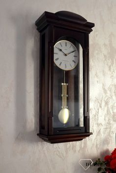 Zegar ścienny drewniany wenge Adler 20238W ✅ Zegar ścienny wykonany z drewna w ciemnej kolorystyce. ✅ Tarcza zegara w jasnym kolorze z czarnymi cyframi rzymskimi ✅ Drewniany zegar z wahadłem (6).JPG