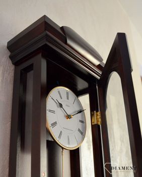 Zegar ścienny drewniany wenge Adler 20238W ✅ Zegar ścienny wykonany z drewna w ciemnej kolorystyce. ✅ Tarcza zegara w jasnym kolorze z czarnymi cyframi rzymskimi ✅ Drewniany zegar z wahadłem (9).JPG
