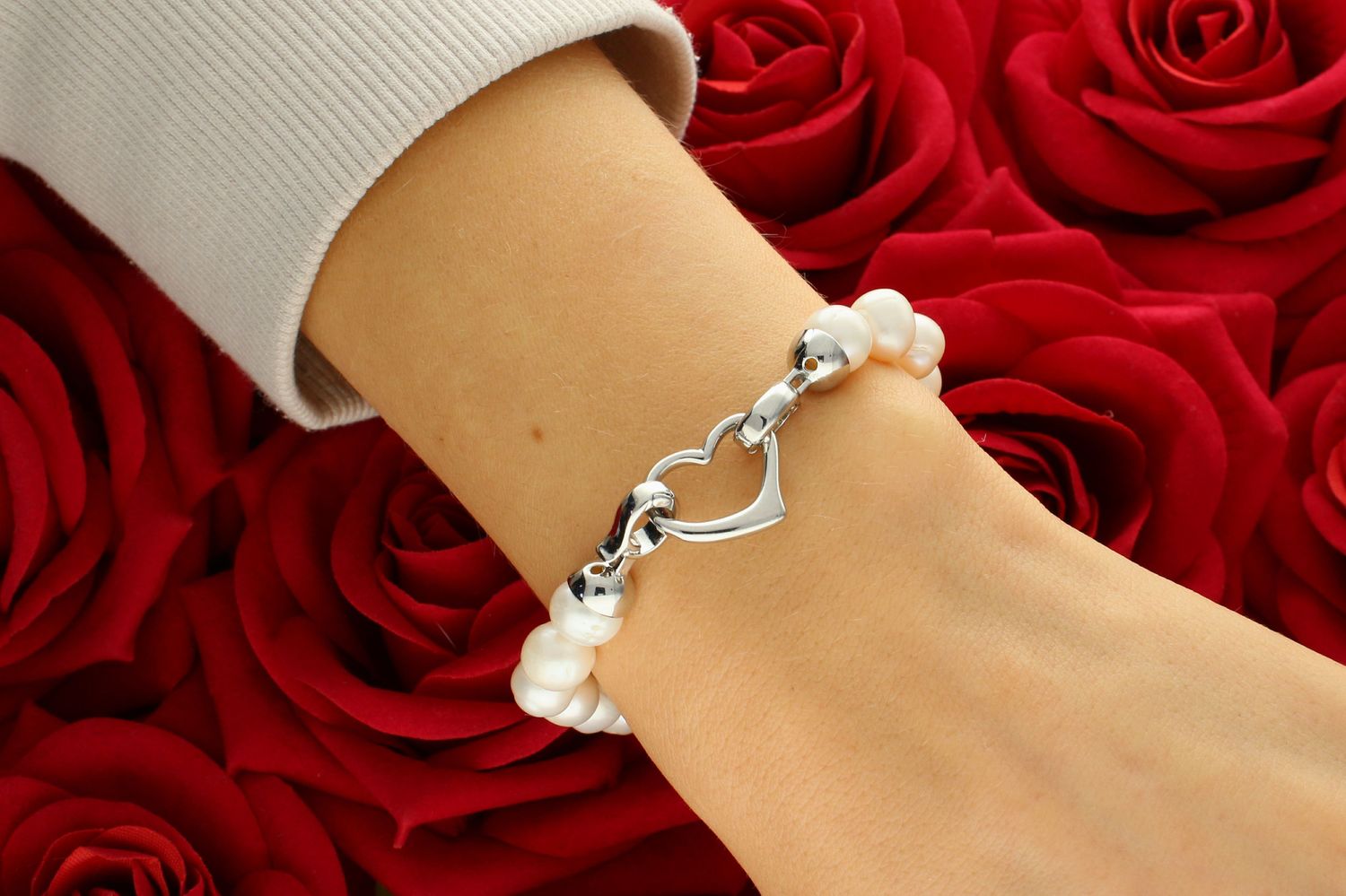 Bransoletka z pereł hodowlanych z sercem stal 2027160508 Niezwykle efektowna, gustowna bransoletka wykonana z certyfikowanych hodowlanych pereł słodkowodnych 1.jpg