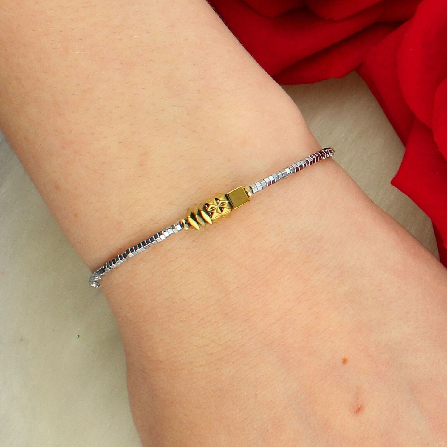 Bransoletka damska Coeur de Lion Cube Trio Facets 2040301716 – srebrno-złota z hematytem (1).jpg