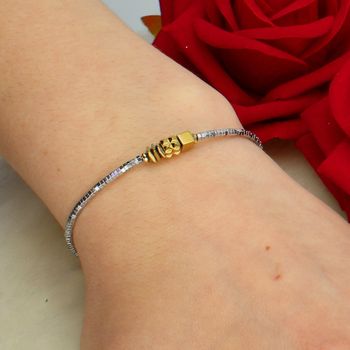 Bransoletka Coeur de Lion Cube Trio Facets 204030-1716 srebrno-złota – hematyt (3).jpg