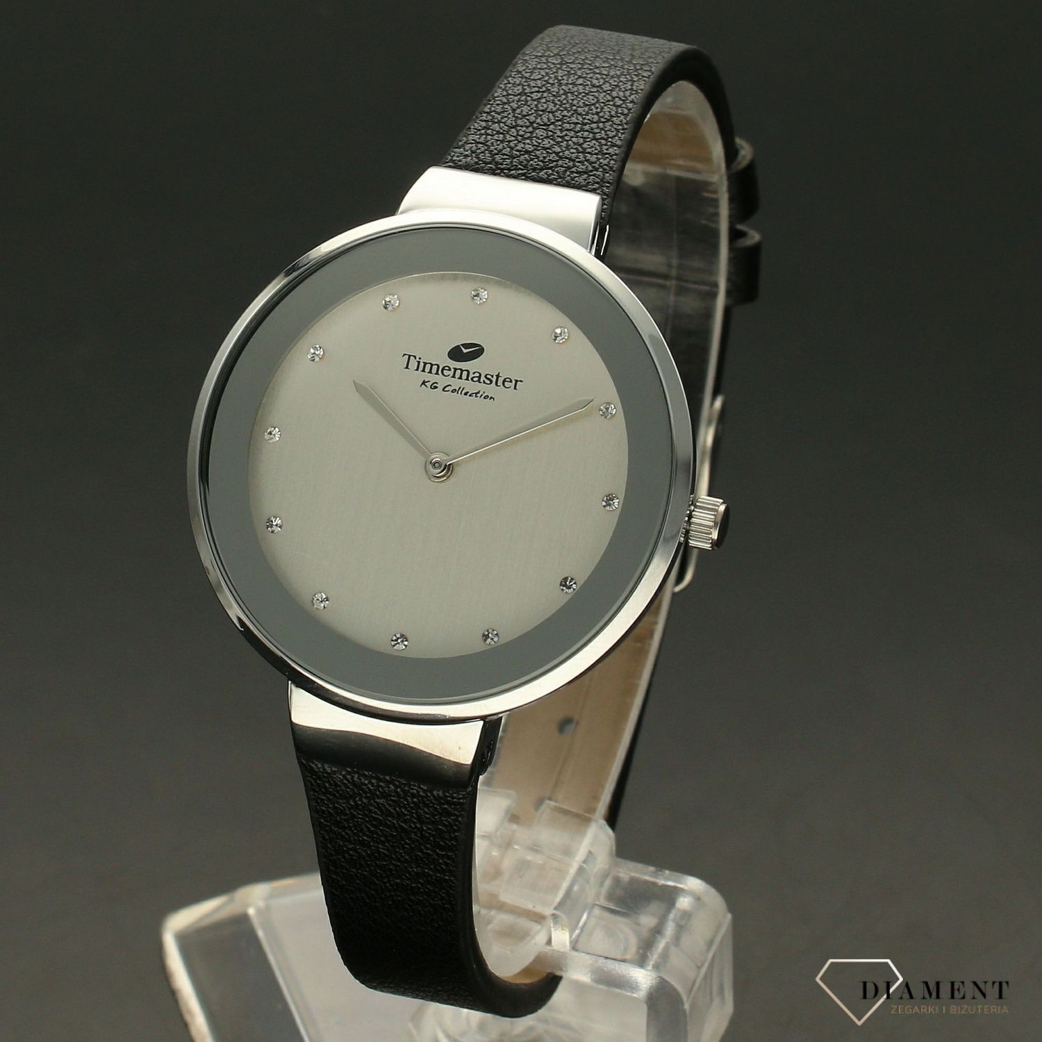 Zegarek damski Timemaster 206-10 czarny pasek srebrna tarcz. Zegarek damski ze srebrną tarczą ozdobiony indeksami w formie błyszczących cyrkonii. Zegarek damski na skórzanym, czarnym pasku. Elegancki zegarek damski. Świetny po.jpg