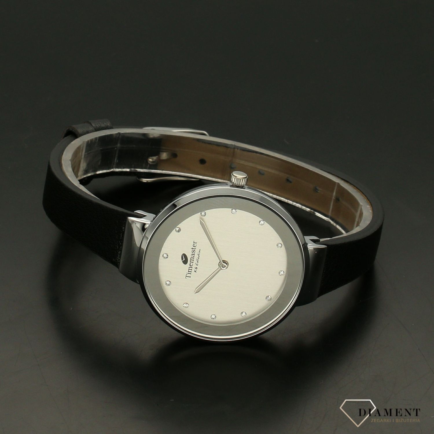 Zegarek damski Timemaster 206-10 czarny pasek srebrna tarcz. Zegarek damski ze srebrną tarczą ozdobiony indeksami w formie błyszczących cyrkonii. Zegarek damski na skórzanym, czarnym pasku. Elegancki zegarek damski. Świetny po.jpg