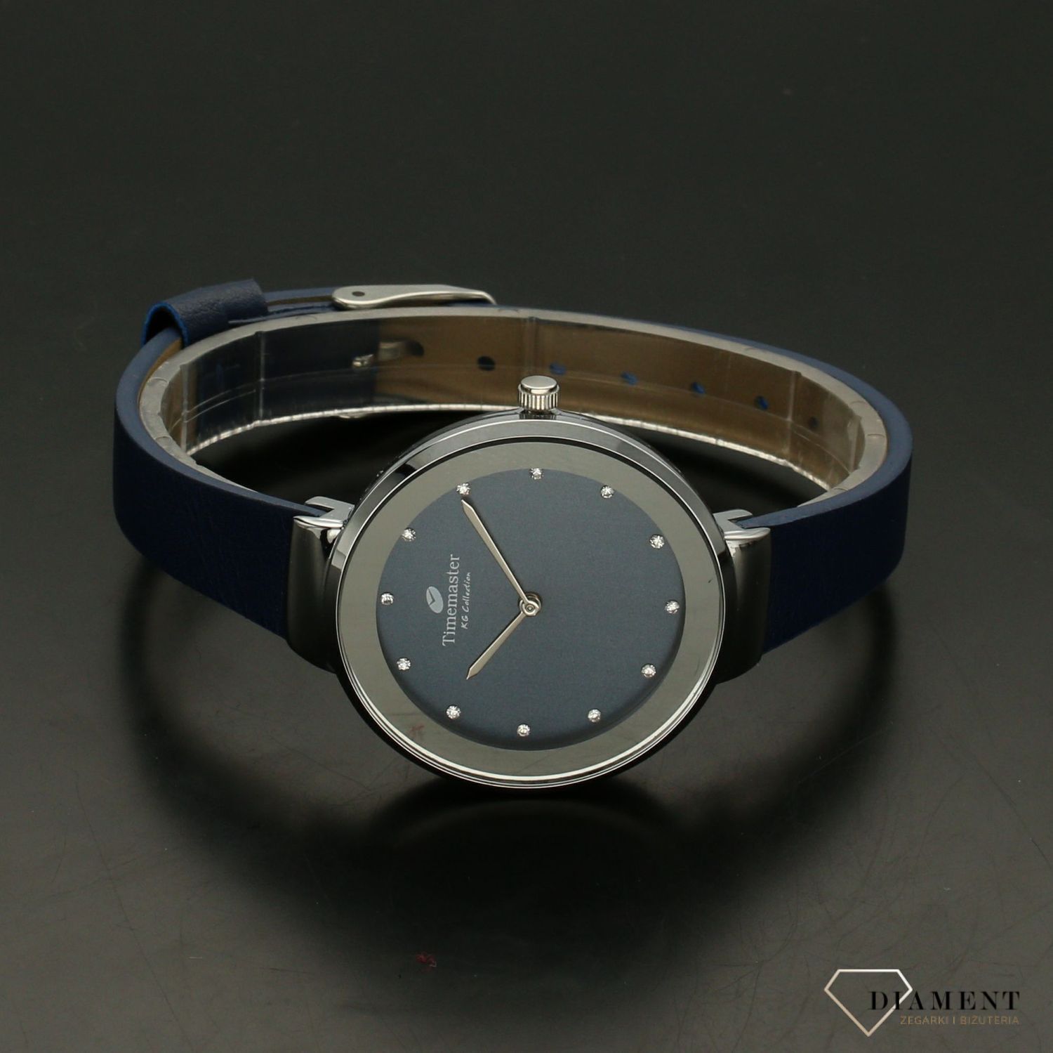 Zegarek damski Timemaster 206-7 niebieski pasek niebieska tarcz. Zegarek damski z niebieską tarczą ozdobiony indeksami w formie błyszczących cyrkonii. Zegarek damski na skórzanym, niebieskim pasku. Elegancki zegarek damski. Św.jpg
