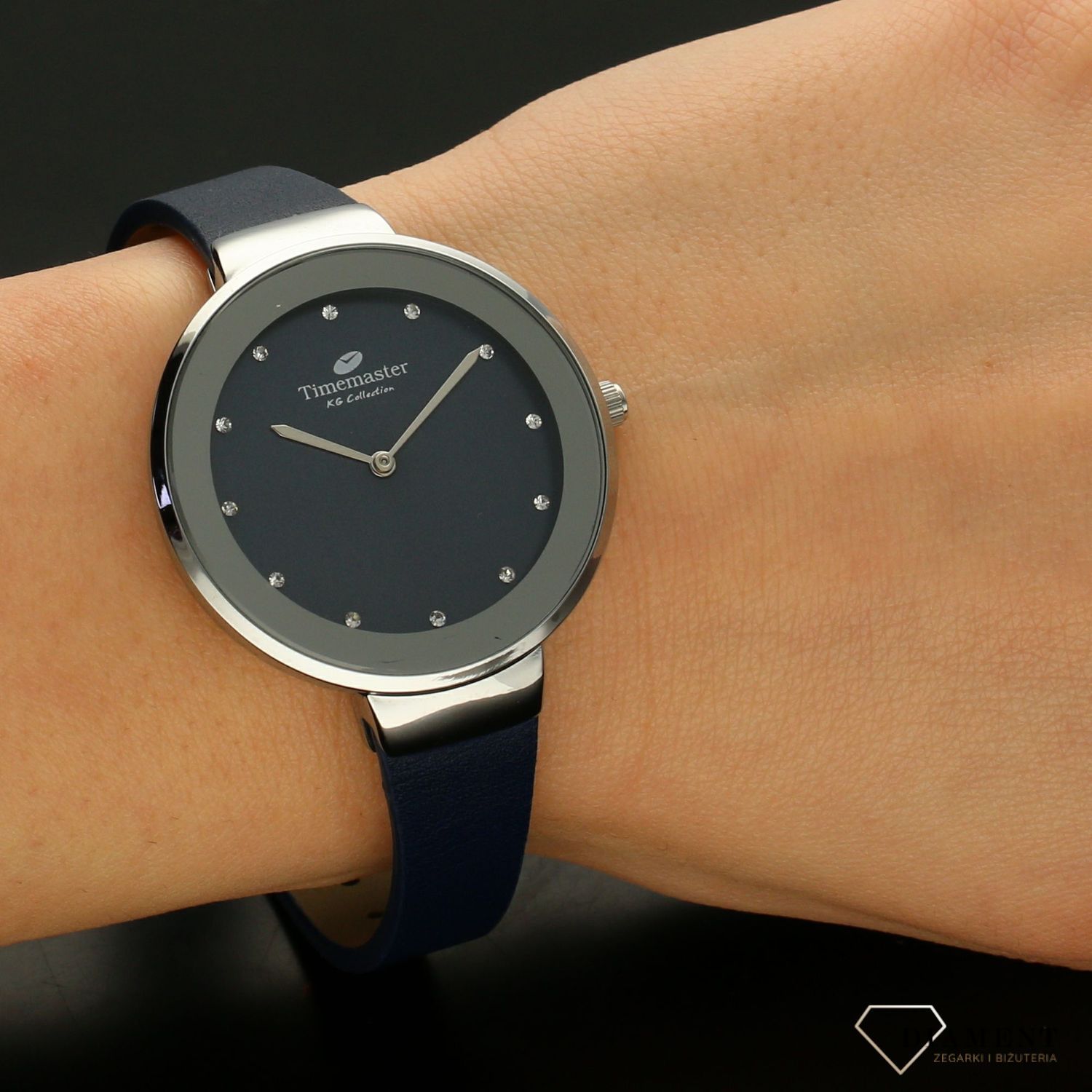 Zegarek damski Timemaster 206-7 niebieski pasek niebieska tarcz. Zegarek damski z niebieską tarczą ozdobiony indeksami w formie błyszczących cyrkonii. Zegarek damski na skórzanym, niebieskim pasku. Elegancki zegarek damski. Św.jpg