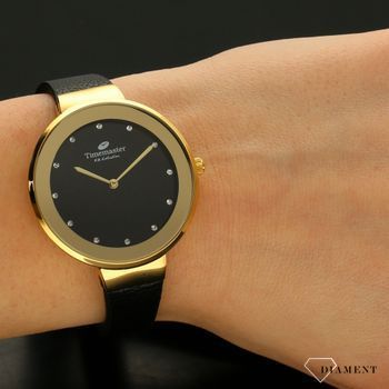 Zegarek damski w kolorze złotym na czarnym paski TIMEMASTER 206-8. Zegarek damski z pozłacaną okrągłą kopertą w kolorze złotym. Zegarek z czarnym skórzanym paskiem. Tarcza w kolorze czarnym z błyszczącymi cyrkoniami. Świetny pom (1).jpg