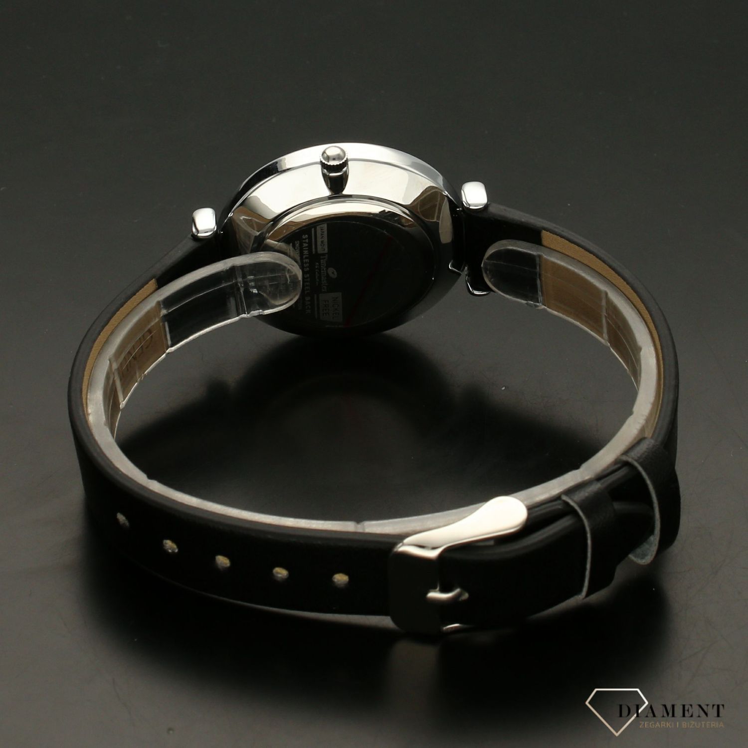 Zegarek damski TIMEMASTER klasyczny 208-38. Zegarek damski zachowany w klasycznej formie. Zegarek damski. Zegarek z białą tarczą z wyraźnymi srebrnymi cyframi arabskimi. Pasek skórzany w kolorze czarnym.  (2).jpg