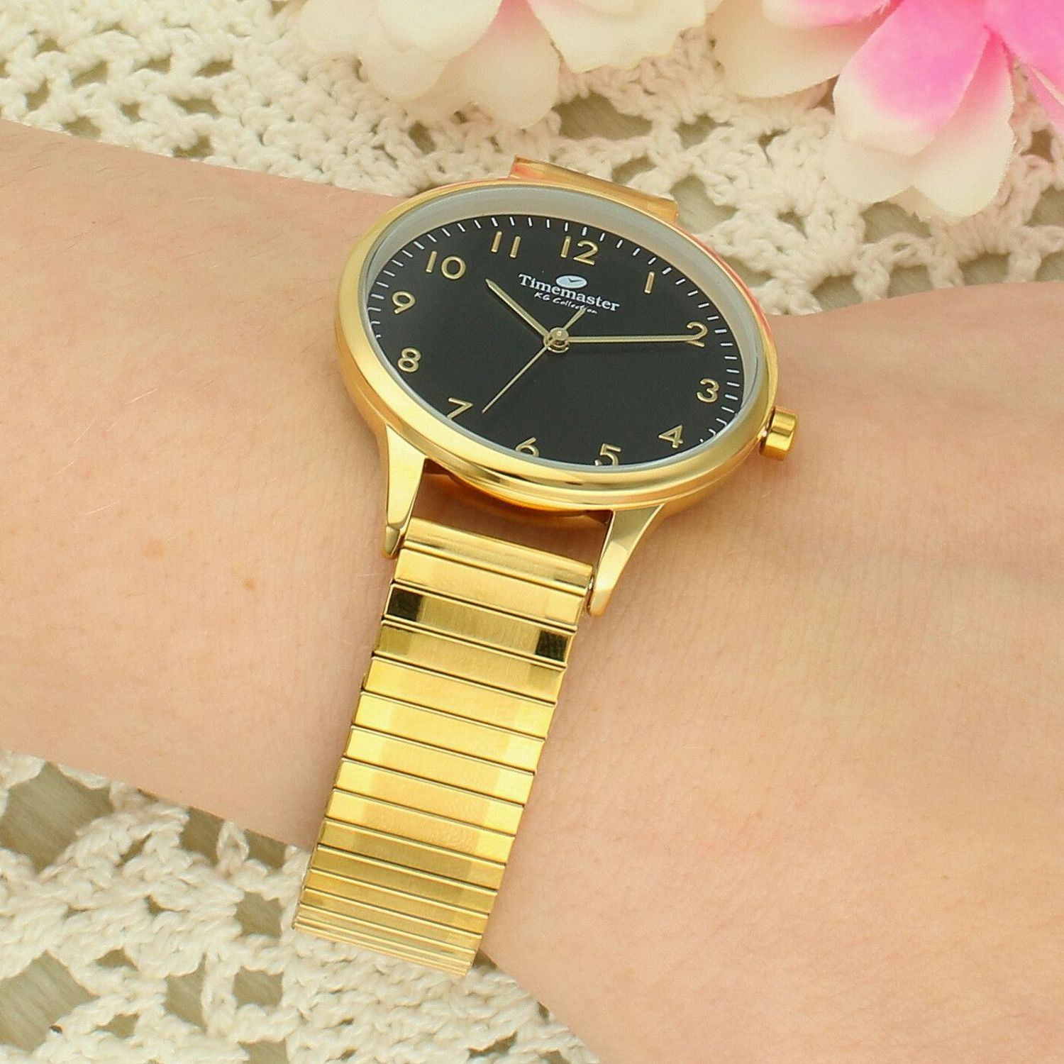 Zegarek damski Timemaster 212-28 – czarna tarcza, złote indeksy, rozciągana bransoleta typu stretch.jpg