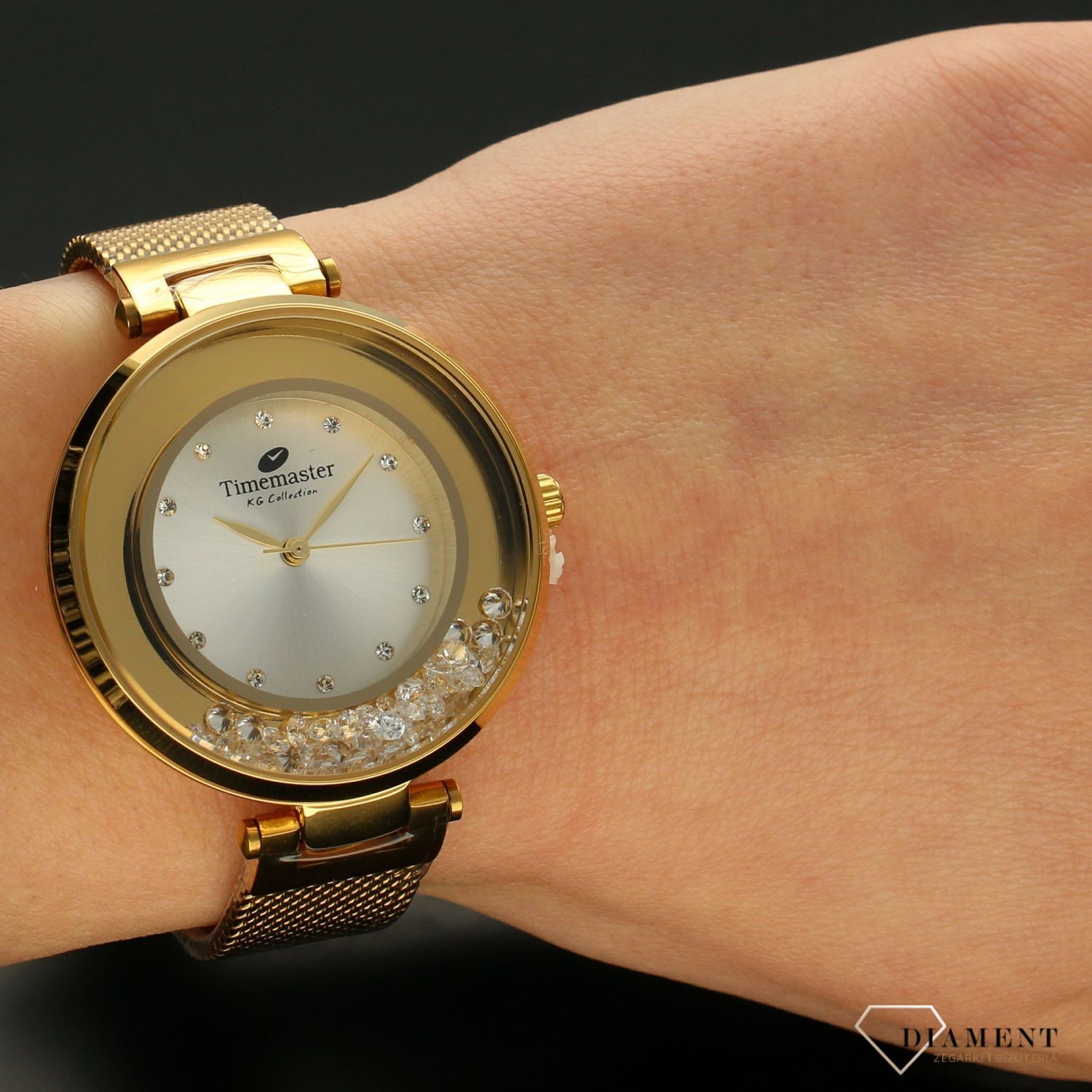 Zegarek damski TIMEMASTER 226-3A złoto z kryształami. Zegarek damski z pięknymi, mieniącymi się kryształami. Zegarek damski w kolorze złota. Tarcza zegarka ozdobiona błyszczącą cyrkonią. Zegarek damski (2).jpg