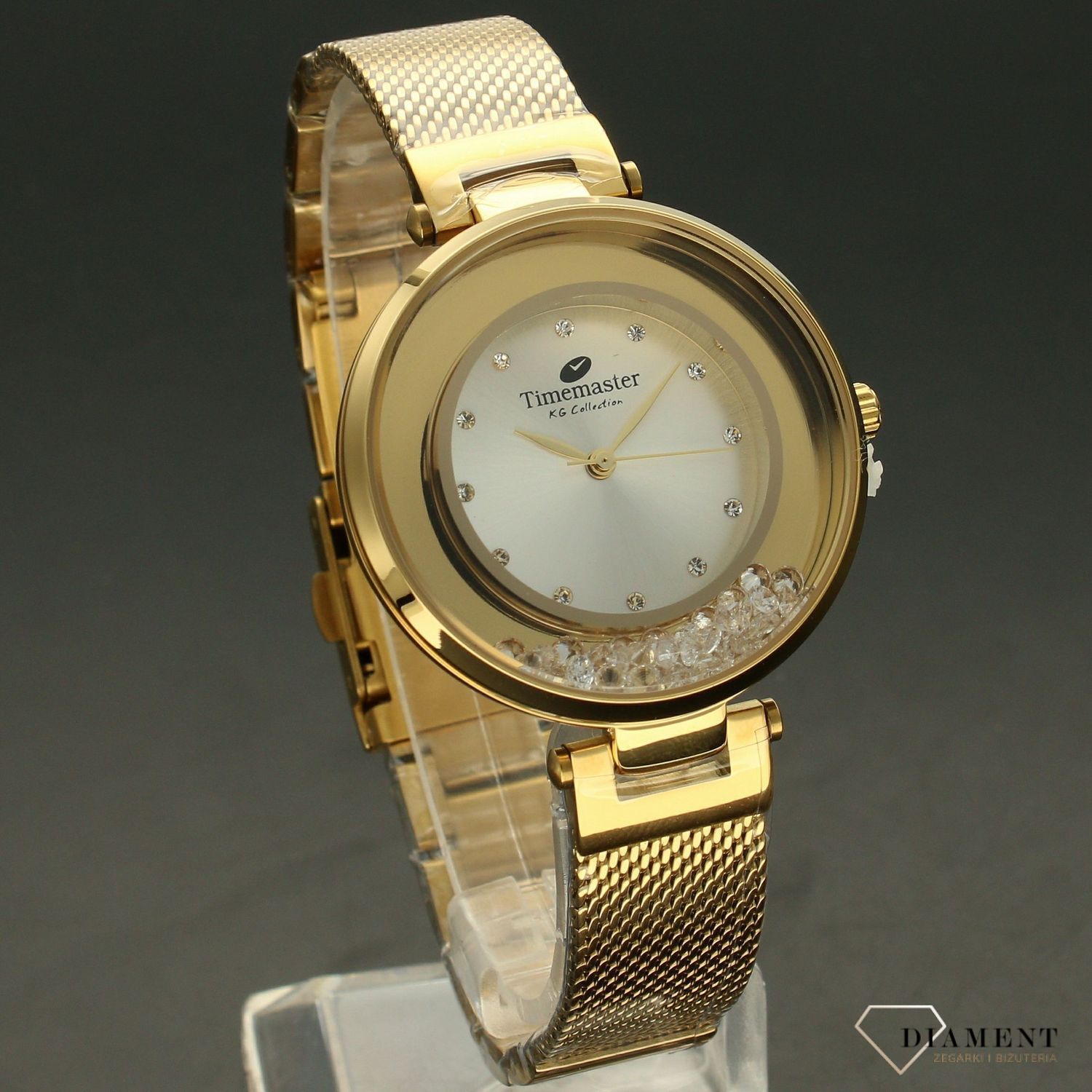 Zegarek damski TIMEMASTER 226-3A złoto z kryształami. Zegarek damski z pięknymi, mieniącymi się kryształami. Zegarek damski w kolorze złota. Tarcza zegarka ozdobiona błyszczącą cyrkonią. Zegarek damski (2).jpg