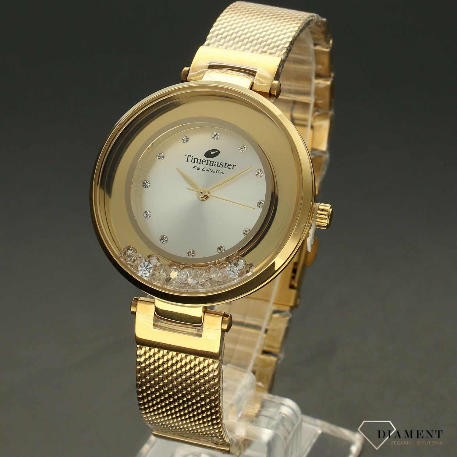 Zegarek damski TIMEMASTER 226-3A złoto z kryształami. Zegarek damski z pięknymi, mieniącymi się kryształami. Zegarek damski w kolorze złota. Tarcza zegarka ozdobiona błyszczącą cyrkonią. Zegarek damski (2).jpg