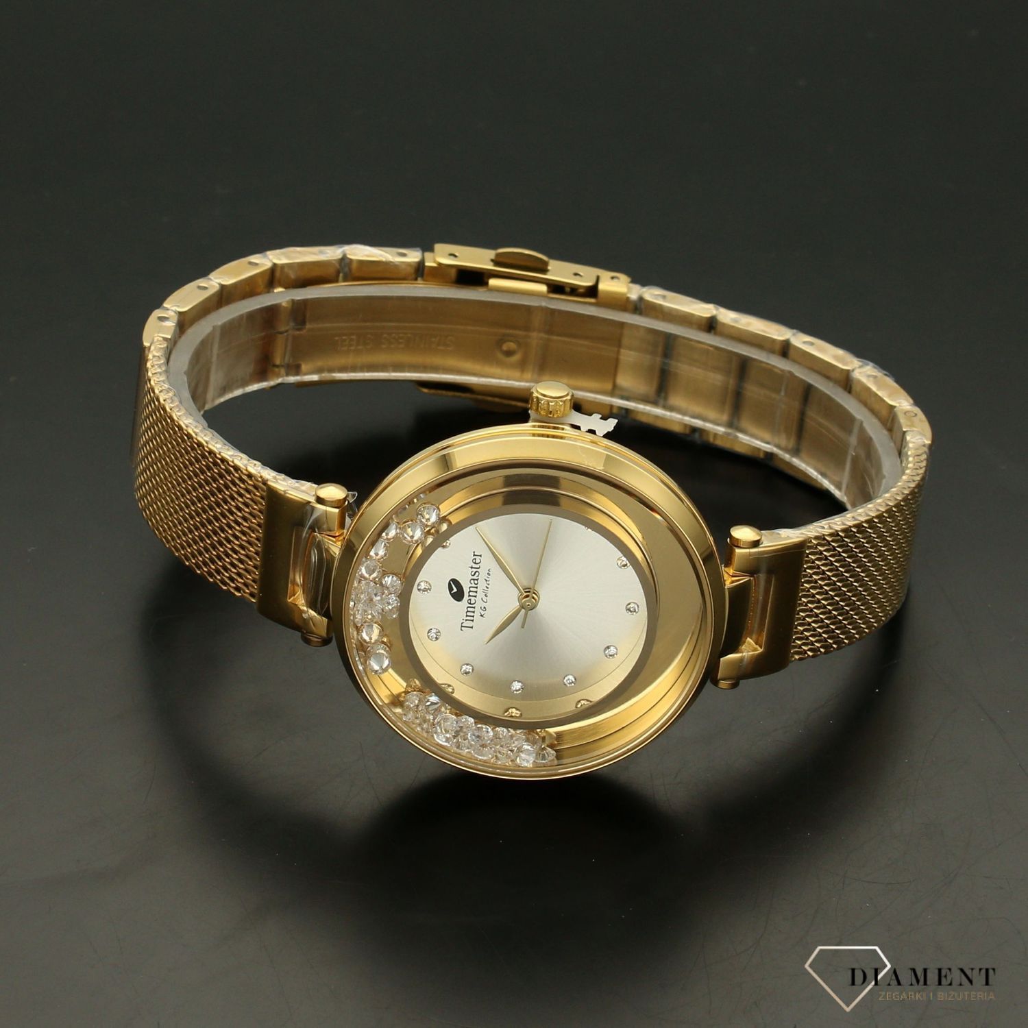 Zegarek damski TIMEMASTER 226-3A złoto z kryształami. Zegarek damski z pięknymi, mieniącymi się kryształami. Zegarek damski w kolorze złota. Tarcza zegarka ozdobiona błyszczącą cyrkonią. Zegarek damski (2).jpg