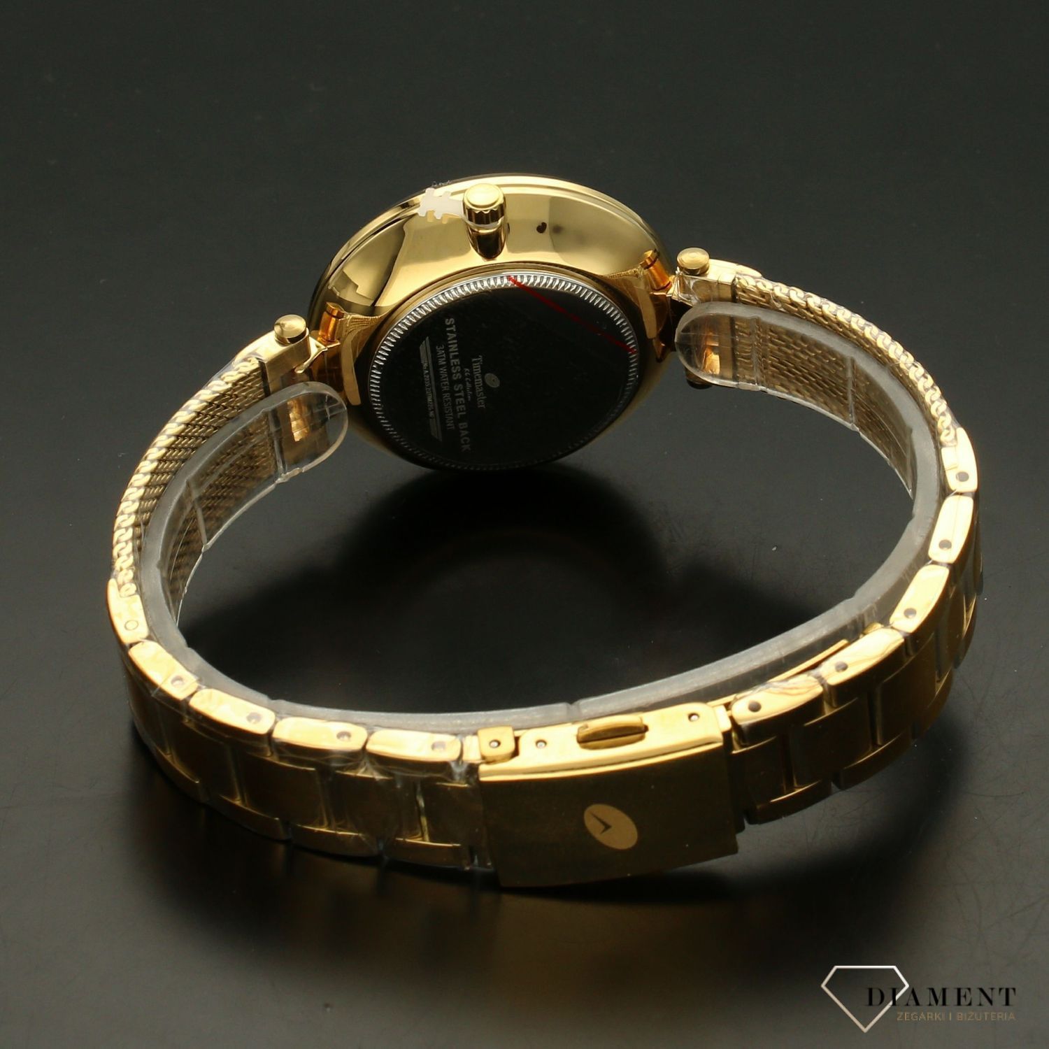 Zegarek damski TIMEMASTER 226-3A złoto z kryształami. Zegarek damski z pięknymi, mieniącymi się kryształami. Zegarek damski w kolorze złota. Tarcza zegarka ozdobiona błyszczącą cyrkonią. Zegarek damski (2).jpg