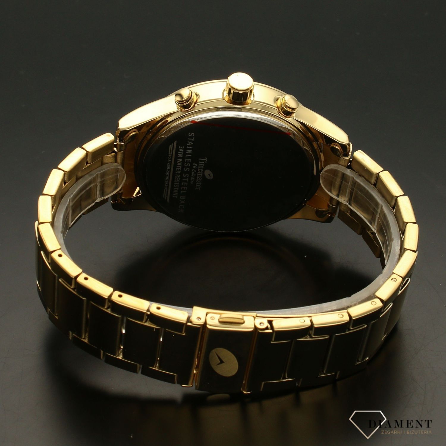 Zegarek męski TIMEMASTER 229-10 złoty. Zegarek męski w złotej kolorystyce z jasną tarczą ozdobioną złotymi dodatkami na tarczy. Zegarek męski w złotej kolorystyce. Elegancki zegarek dla eleganckiego mężczyzny.  (2).jpg