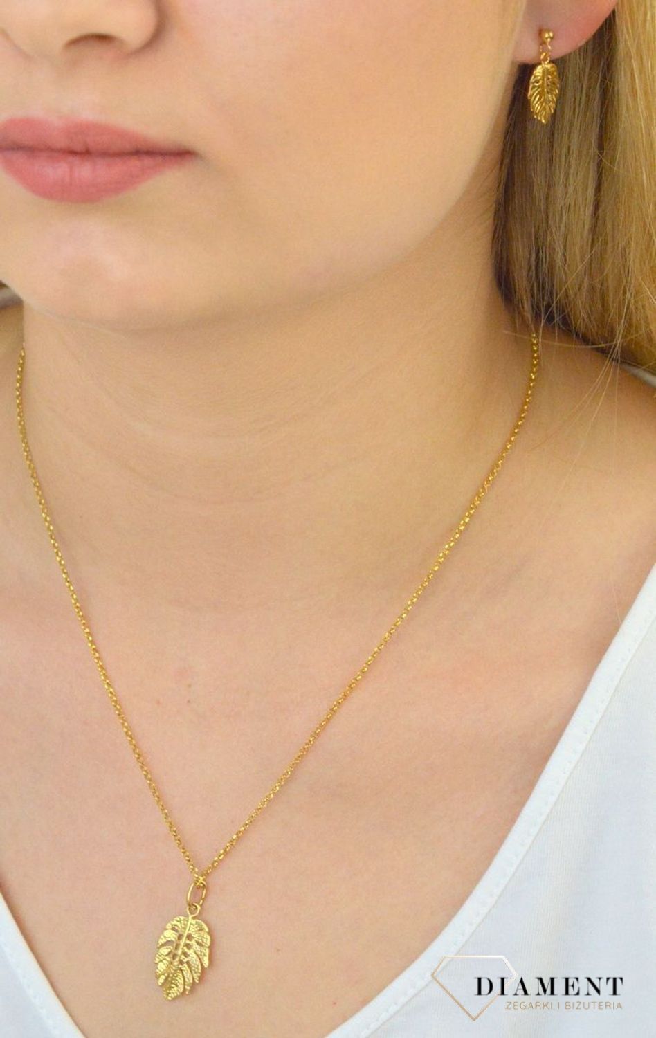 Srebrne kolczyki pozłacane listki 271235480250. Srebrne kolczyki pozłacane. Kolczyki pozłacane listki. Kolczyki w kształcie listków. Kolczyki srebrne pozłacane o modnym wzorze. Kolczyki idealne na prezent..jpg