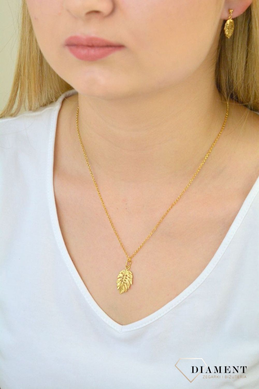 Srebrne kolczyki pozłacane listki 271235480250. Srebrne kolczyki pozłacane. Kolczyki pozłacane listki. Kolczyki w kształcie listków. Kolczyki srebrne pozłacane o modnym wzorze. Kolczyki idealne na prezent..jpg