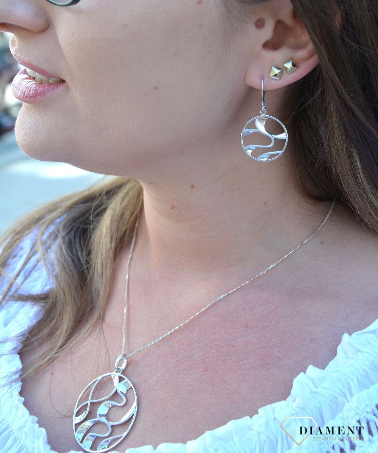 Kolczyki srebrne wiszące koła z falami 27127833-0500..jpg